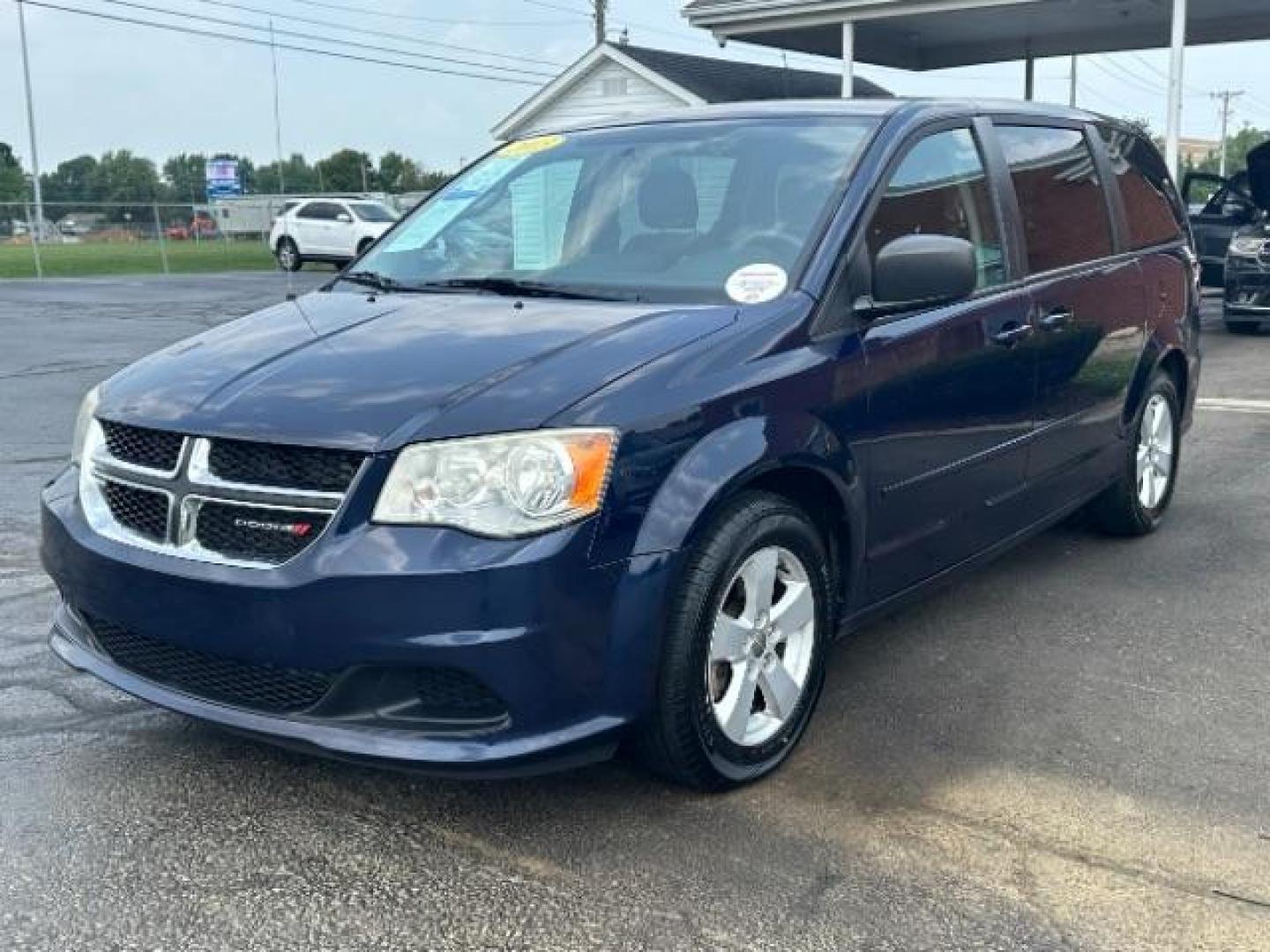 2013 Blue Streak Pearl Dodge Grand Caravan SE (2C4RDGBG1DR) with an 3.6L V6 DOHC 24V engine, 6-Speed Automatic transmission, located at 401 Woodman Dr, Riverside, OH, 45431, (937) 908-9800, 39.760899, -84.123421 - Photo#2