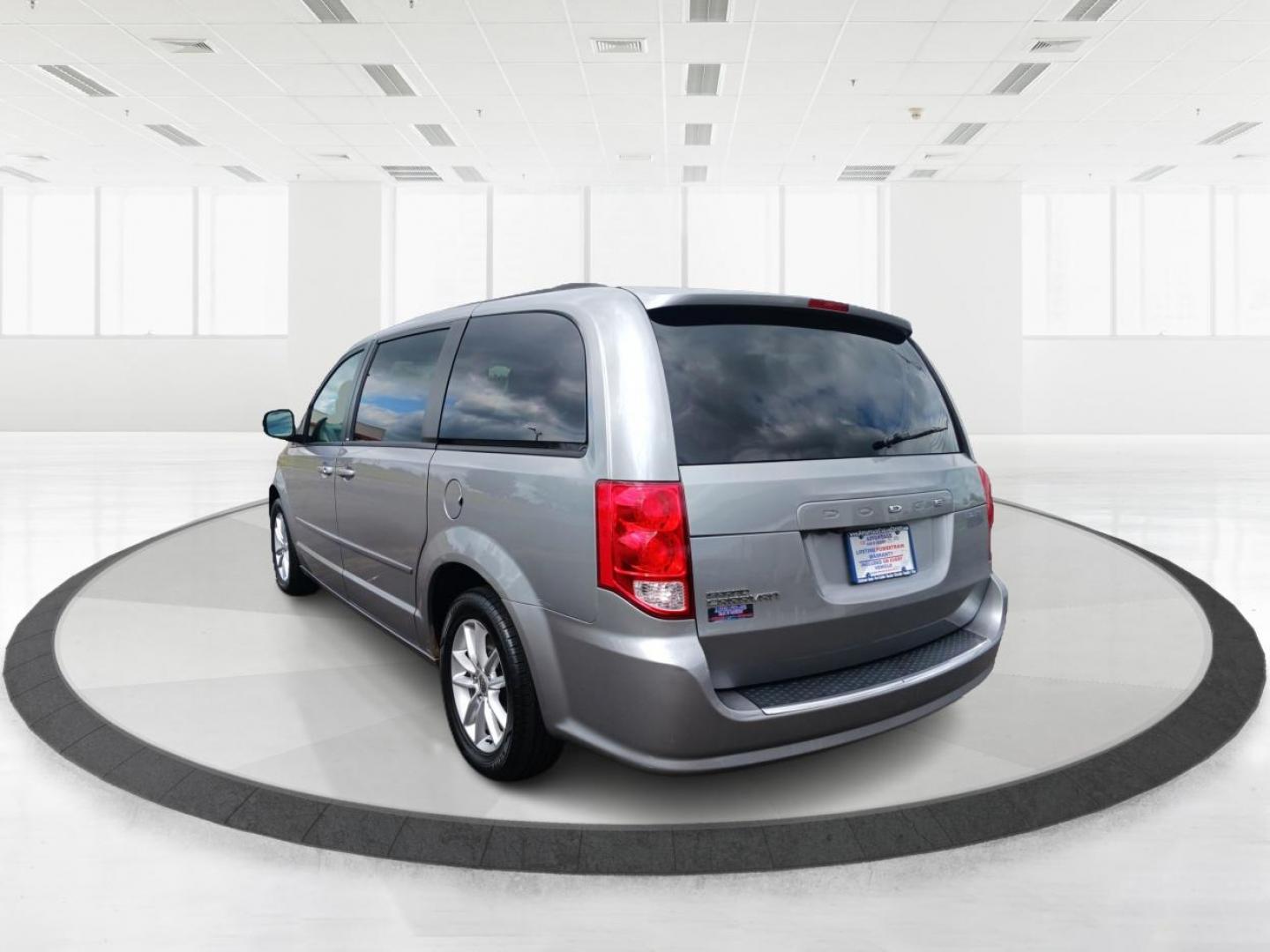 2013 Maximum Steel Metallic Dodge Grand Caravan SXT (2C4RDGCGXDR) with an 3.6L V6 DOHC 24V engine, 6-Speed Automatic transmission, located at 1230 East Main St, Xenia, OH, 45385, (937) 908-9800, 39.688026, -83.910172 - Photo#4