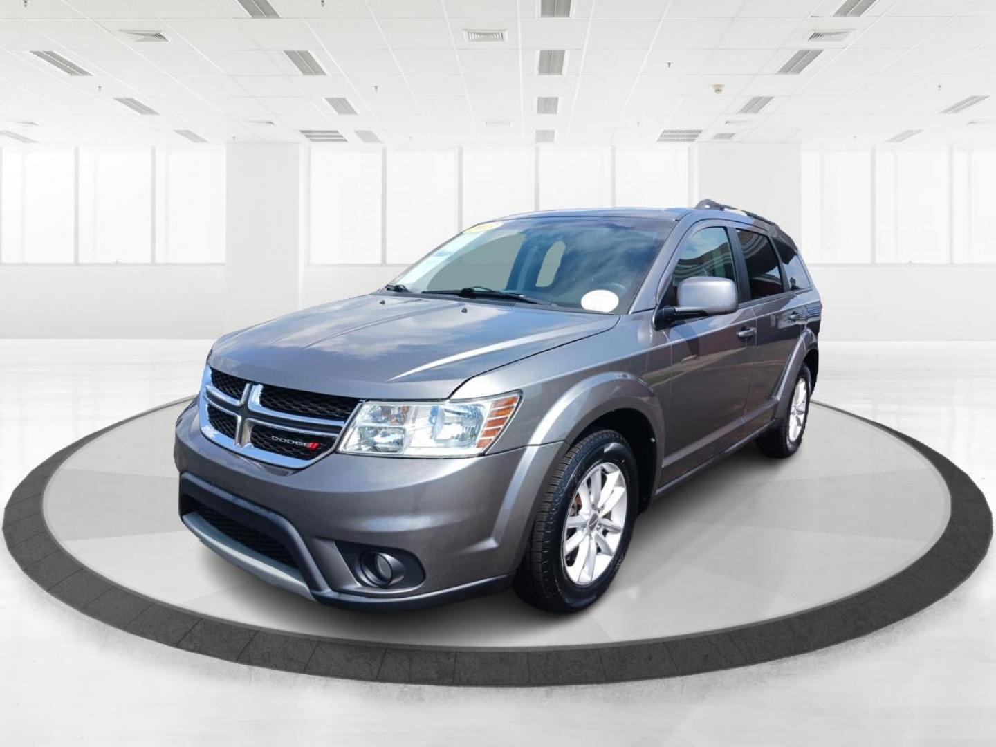 2013 Storm Grey Pearl Dodge Journey SXT (3C4PDCBB2DT) with an 2.4L L6 DOHC 16V engine, 4-Speed Automatic transmission, located at 1184 Kauffman Ave, Fairborn, OH, 45324, (937) 908-9800, 39.807072, -84.030914 - Photo#7