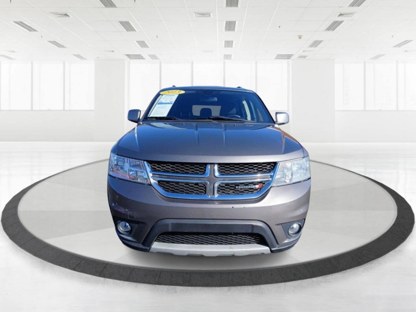 2013 Storm Grey Pearl Dodge Journey SXT (3C4PDCBG0DT) with an 3.6L V6 DOHC 24V engine, 6-Speed Automatic transmission, located at 880 E. National Road, Vandalia, OH, 45377, (937) 908-9800, 39.891918, -84.183594 - Photo#6