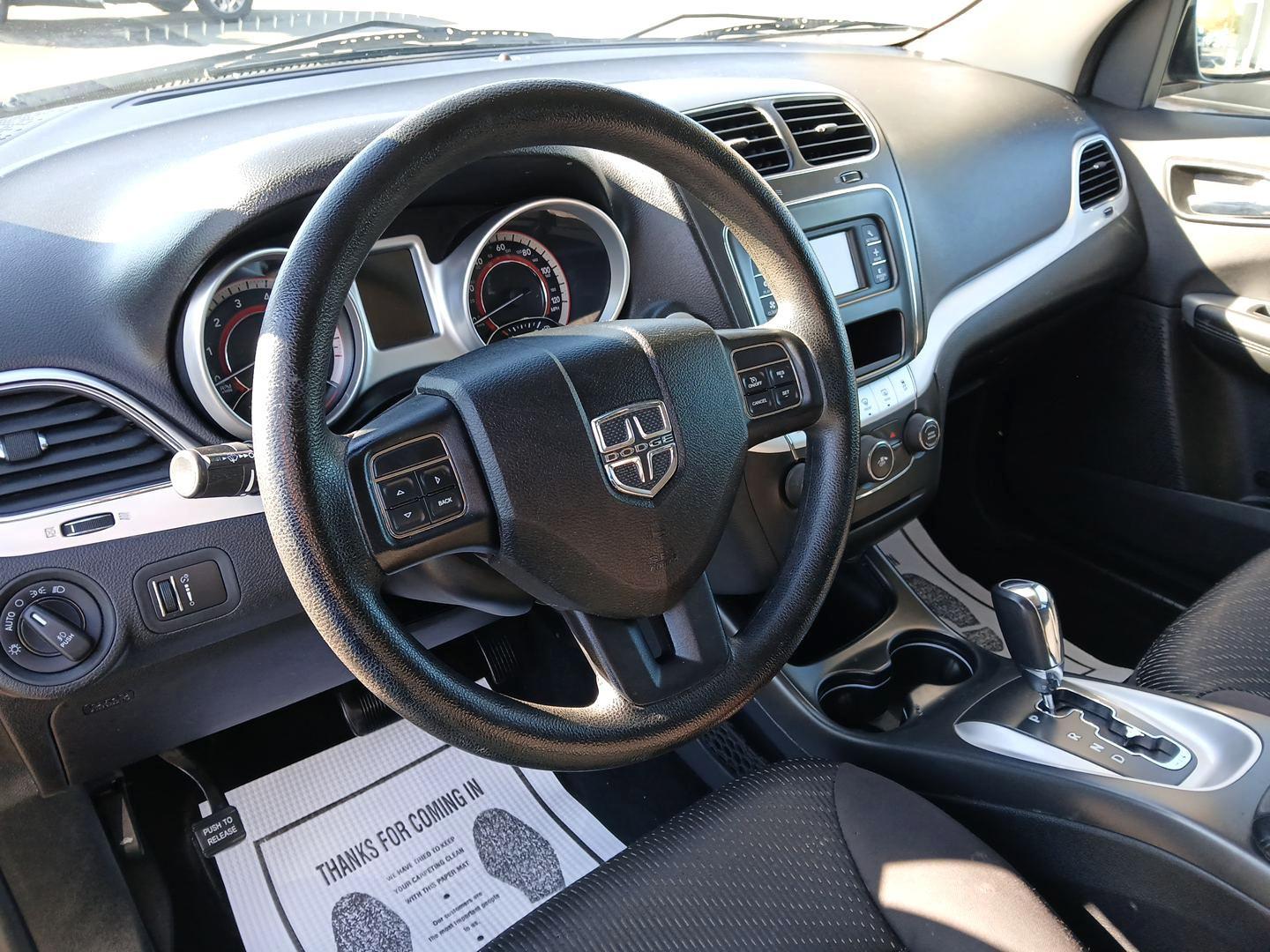 2013 Storm Grey Pearl Dodge Journey SXT (3C4PDCBG0DT) with an 3.6L V6 DOHC 24V engine, 6-Speed Automatic transmission, located at 880 E. National Road, Vandalia, OH, 45377, (937) 908-9800, 39.891918, -84.183594 - Photo#8