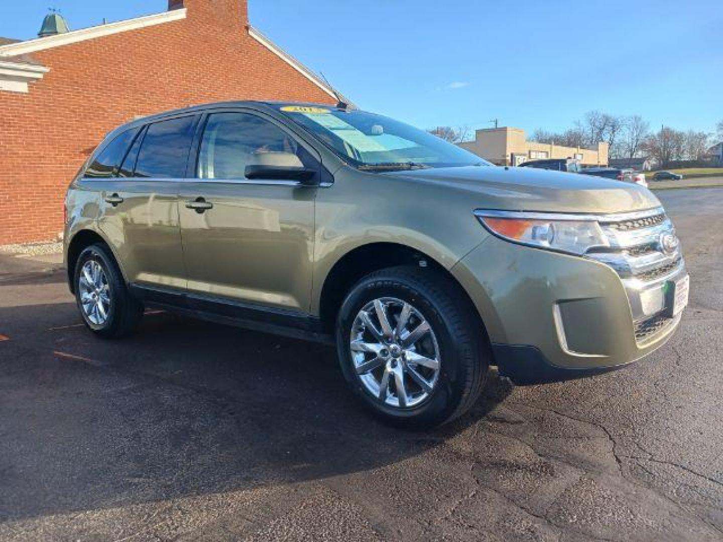 2013 Green Ford Edge Limited AWD (2FMDK4KC3DB) with an 3.5L V6 DOHC 24V engine, 6-Speed Automatic transmission, located at 1099 N County Rd 25A , Troy, OH, 45373, (937) 908-9800, 40.057079, -84.212883 - Photo#0