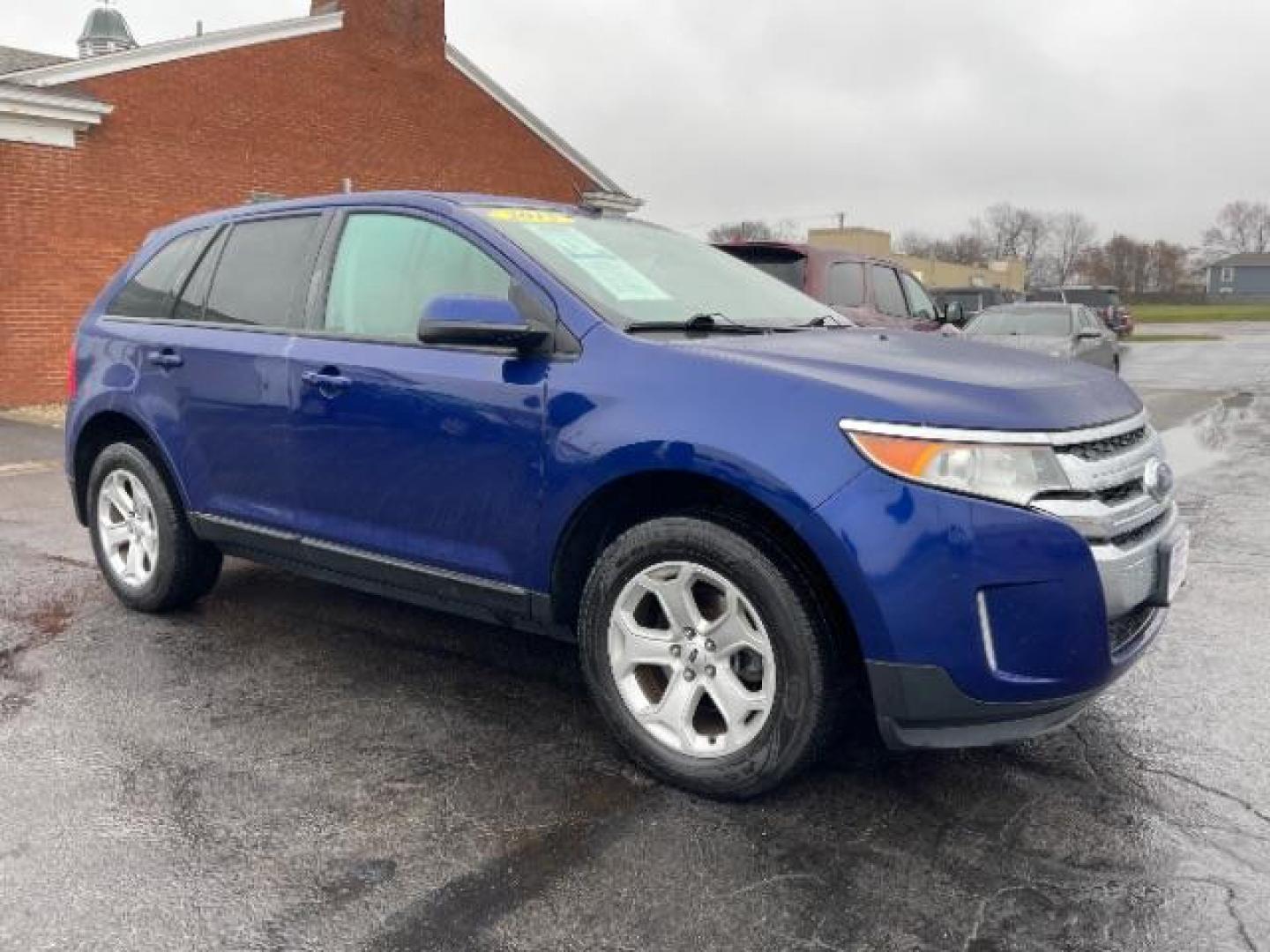 2013 Deep Impact Blue Metallic Ford Edge SEL AWD (2FMDK4JC7DB) with an 3.5L V6 DOHC 24V engine, 6-Speed Automatic transmission, located at 880 E. National Road, Vandalia, OH, 45377, (937) 908-9800, 39.891918, -84.183594 - Photo#0