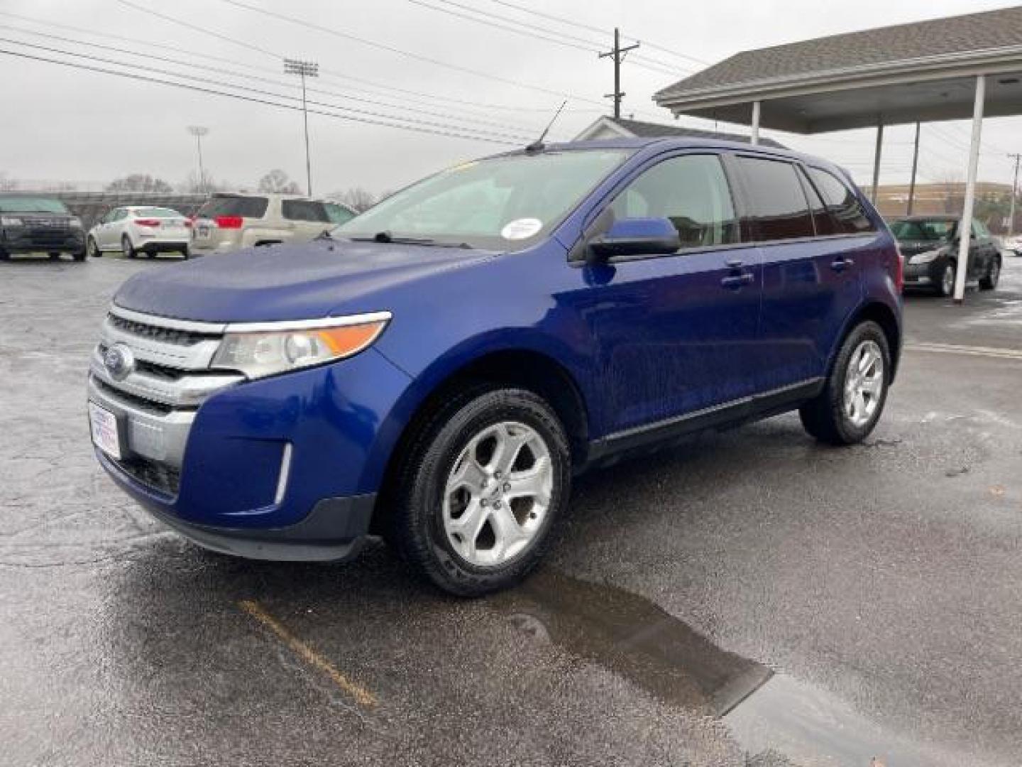 2013 Deep Impact Blue Metallic Ford Edge SEL AWD (2FMDK4JC7DB) with an 3.5L V6 DOHC 24V engine, 6-Speed Automatic transmission, located at 880 E. National Road, Vandalia, OH, 45377, (937) 908-9800, 39.891918, -84.183594 - Photo#1