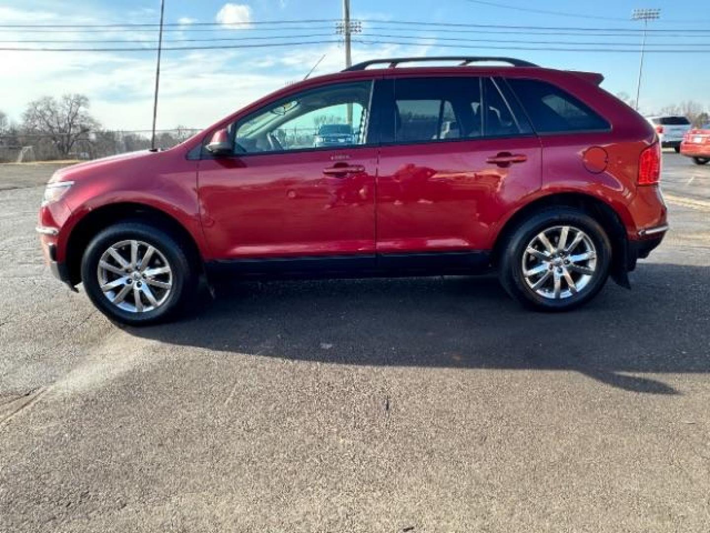 2013 Ruby Red Metallic Ford Edge SEL AWD (2FMDK4JC0DB) with an 3.5L V6 DOHC 24V engine, 6-Speed Automatic transmission, located at 1230 East Main St, Xenia, OH, 45385, (937) 908-9800, 39.688026, -83.910172 - Photo#2