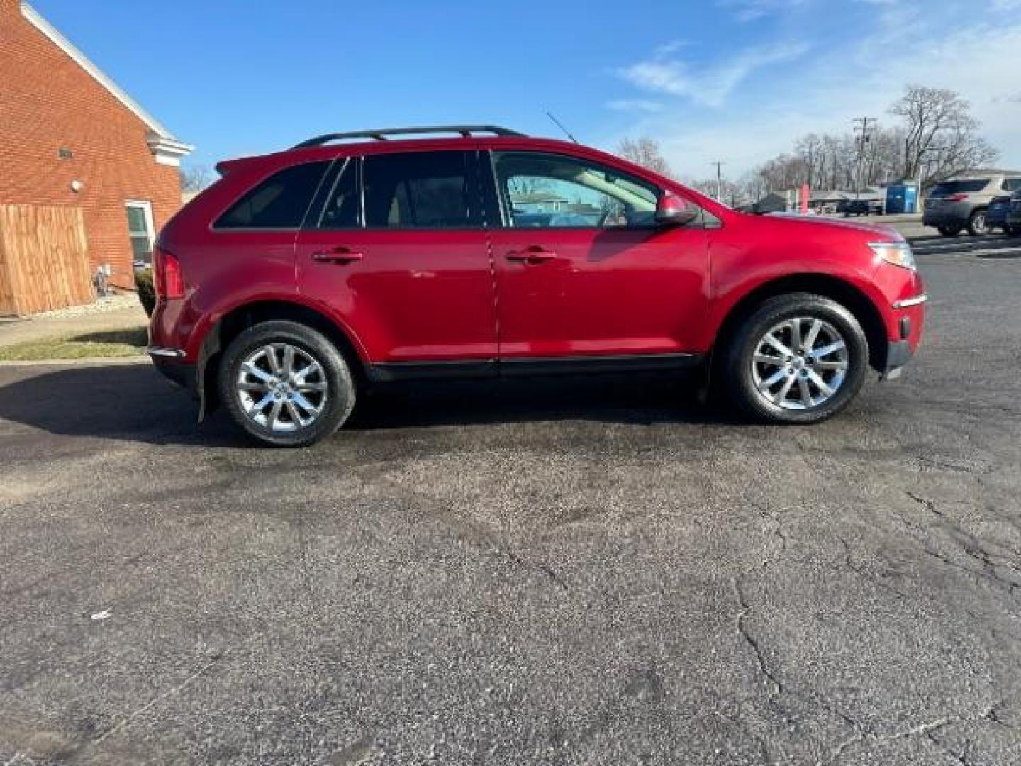 2013 Ruby Red Metallic Ford Edge SEL AWD (2FMDK4JC0DB) with an 3.5L V6 DOHC 24V engine, 6-Speed Automatic transmission, located at 1230 East Main St, Xenia, OH, 45385, (937) 908-9800, 39.688026, -83.910172 - Photo#4