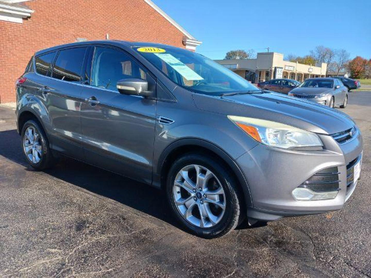 2013 Sterling Grey Metallic Ford Escape SEL 4WD (1FMCU9H94DU) with an 2.0L L4 DOHC 16V engine, 6-Speed Automatic transmission, located at 1951 S Dayton Lakeview Rd., New Carlisle, OH, 45344, (937) 908-9800, 39.890999, -84.050255 - Photo#0