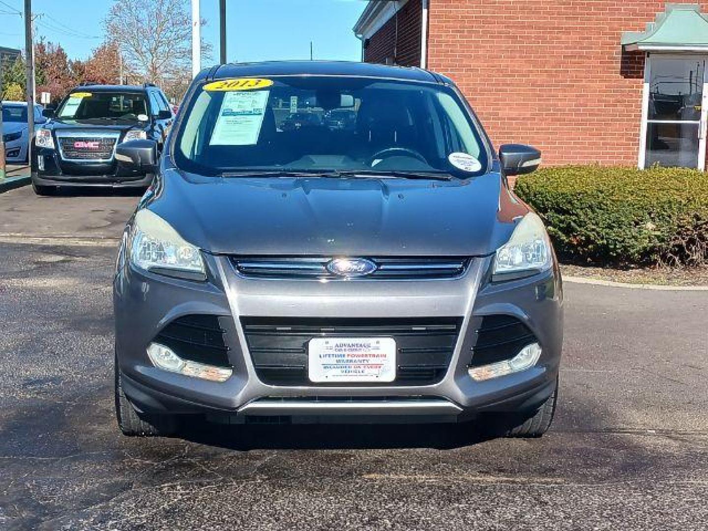 2013 Sterling Grey Metallic Ford Escape SEL 4WD (1FMCU9H94DU) with an 2.0L L4 DOHC 16V engine, 6-Speed Automatic transmission, located at 1951 S Dayton Lakeview Rd., New Carlisle, OH, 45344, (937) 908-9800, 39.890999, -84.050255 - Photo#1