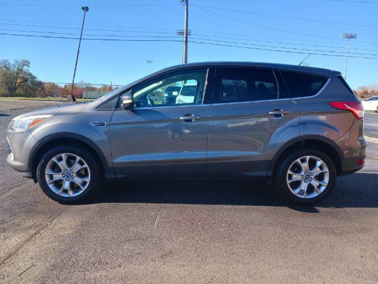 2013 Sterling Grey Metallic Ford Escape SEL 4WD (1FMCU9H94DU) with an 2.0L L4 DOHC 16V engine, 6-Speed Automatic transmission, located at 1951 S Dayton Lakeview Rd., New Carlisle, OH, 45344, (937) 908-9800, 39.890999, -84.050255 - Photo#3