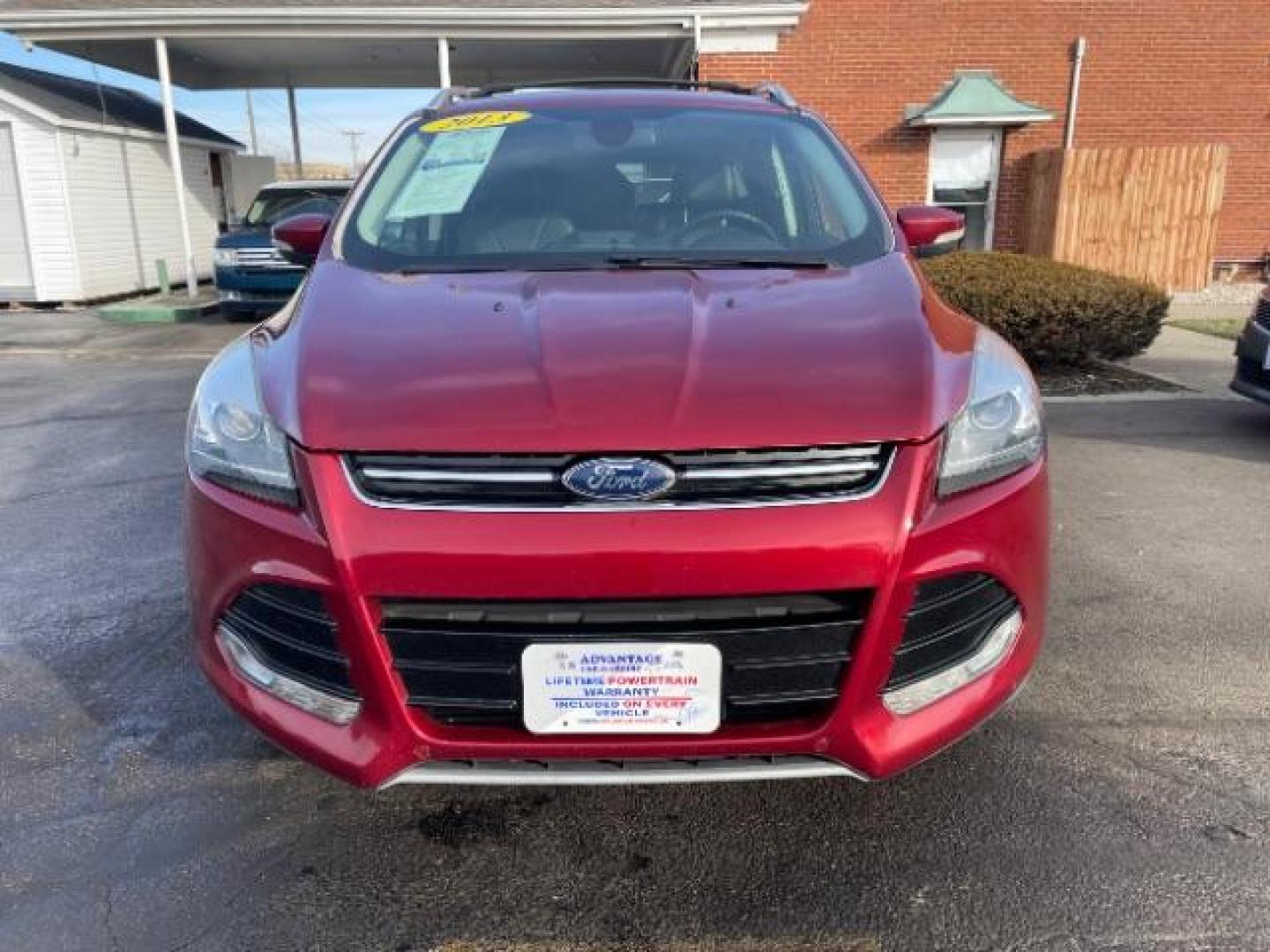 2013 Ruby Red Metallic Tinted Ford Escape Titanium 4WD (1FMCU9J92DU) with an 2.0L L4 DOHC 16V engine, 6-Speed Automatic transmission, located at 880 E. National Road, Vandalia, OH, 45377, (937) 908-9800, 39.891918, -84.183594 - Photo#2