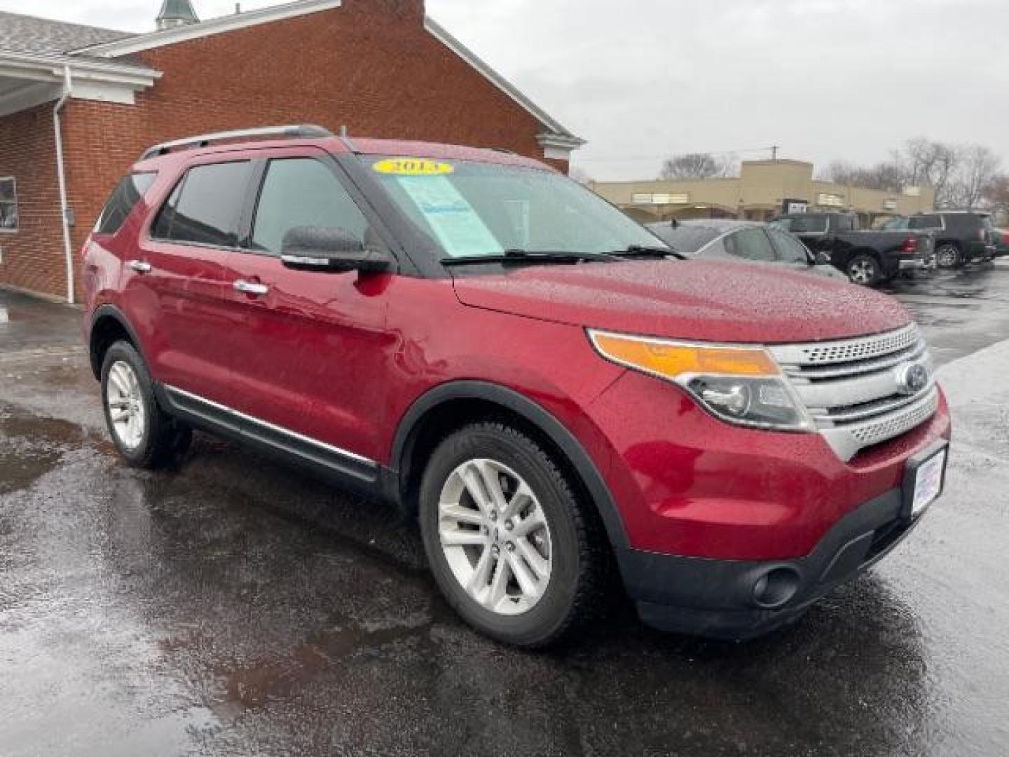 2013 Ruby Red Metallic Ford Explorer XLT 4WD (1FM5K8D83DG) with an 3.5L V6 DOHC 24V engine, 6-Speed Automatic transmission, located at 1099 N County Rd 25A , Troy, OH, 45373, (937) 908-9800, 40.057079, -84.212883 - Photo#0