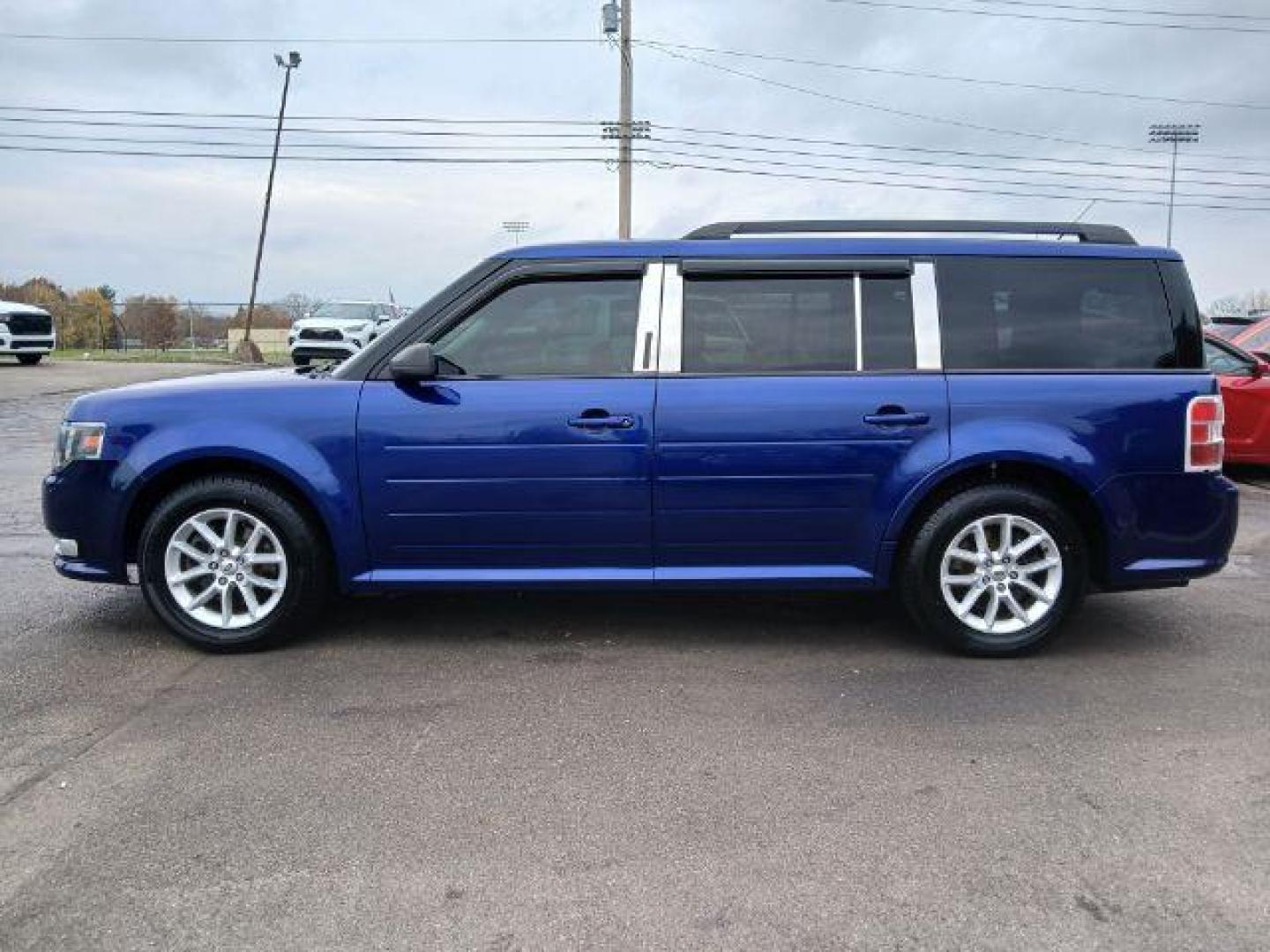 2013 Deep Impact Blue Metallic Ford Flex SE FWD (2FMGK5B8XDB) with an 3.5L V6 DOHC 24V engine, 6-Speed Automatic Overdrive transmission, located at 1951 S Dayton Lakeview Rd., New Carlisle, OH, 45344, (937) 908-9800, 39.890999, -84.050255 - 2013 Ford Flex SE FWD - Photo#15