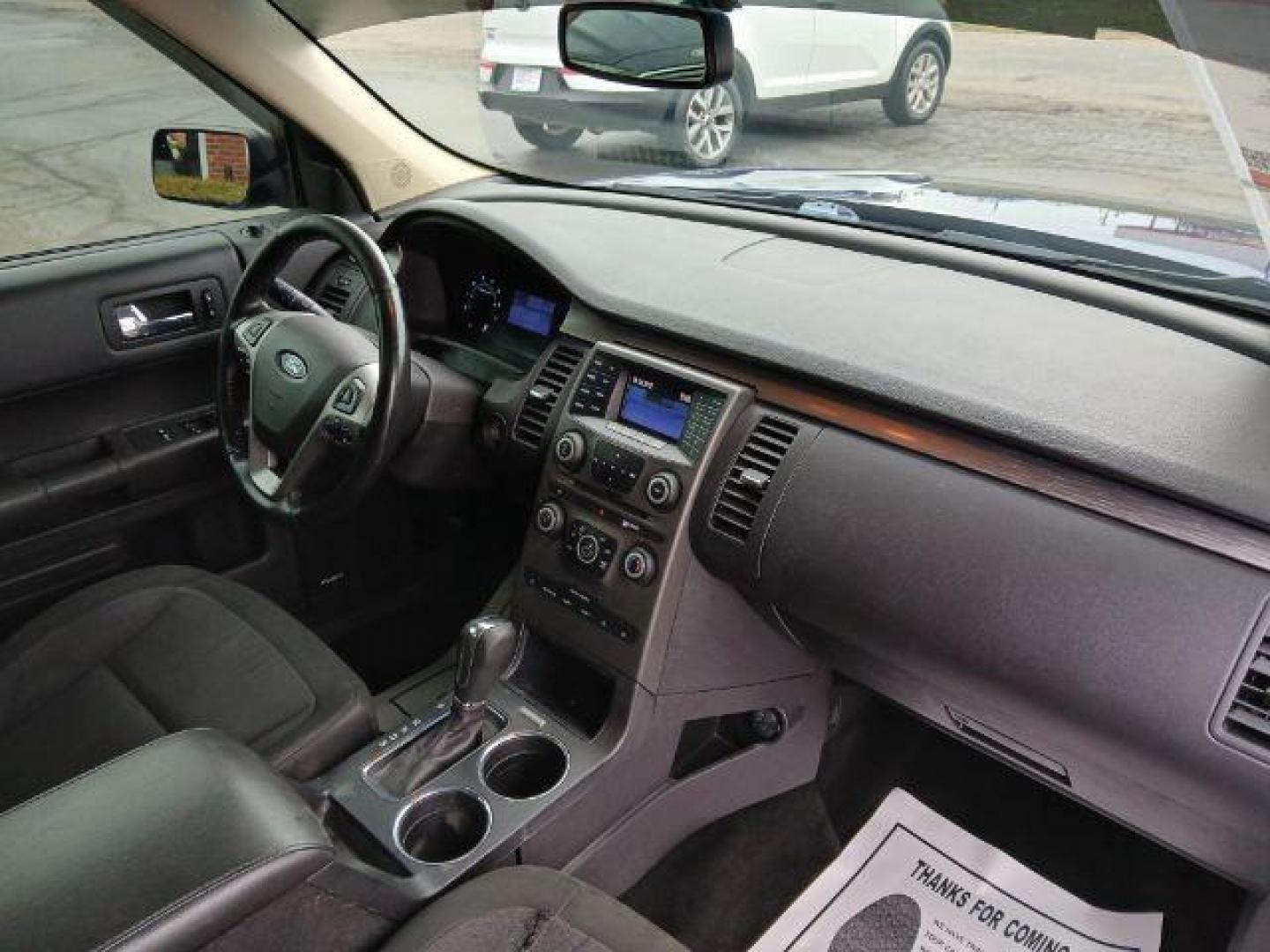 2013 Deep Impact Blue Metallic Ford Flex SE FWD (2FMGK5B8XDB) with an 3.5L V6 DOHC 24V engine, 6-Speed Automatic Overdrive transmission, located at 1951 S Dayton Lakeview Rd., New Carlisle, OH, 45344, (937) 908-9800, 39.890999, -84.050255 - 2013 Ford Flex SE FWD - Photo#21