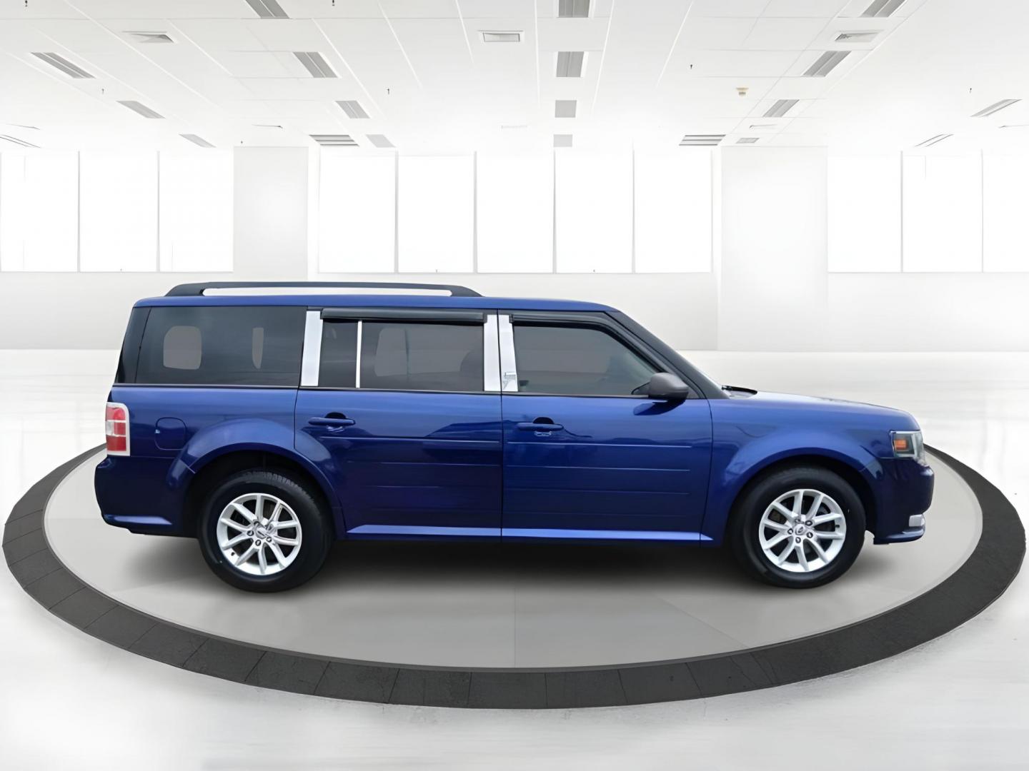 2013 Deep Impact Blue Metallic Ford Flex SE FWD (2FMGK5B8XDB) with an 3.5L V6 DOHC 24V engine, 6-Speed Automatic Overdrive transmission, located at 1951 S Dayton Lakeview Rd., New Carlisle, OH, 45344, (937) 908-9800, 39.890999, -84.050255 - Photo#1