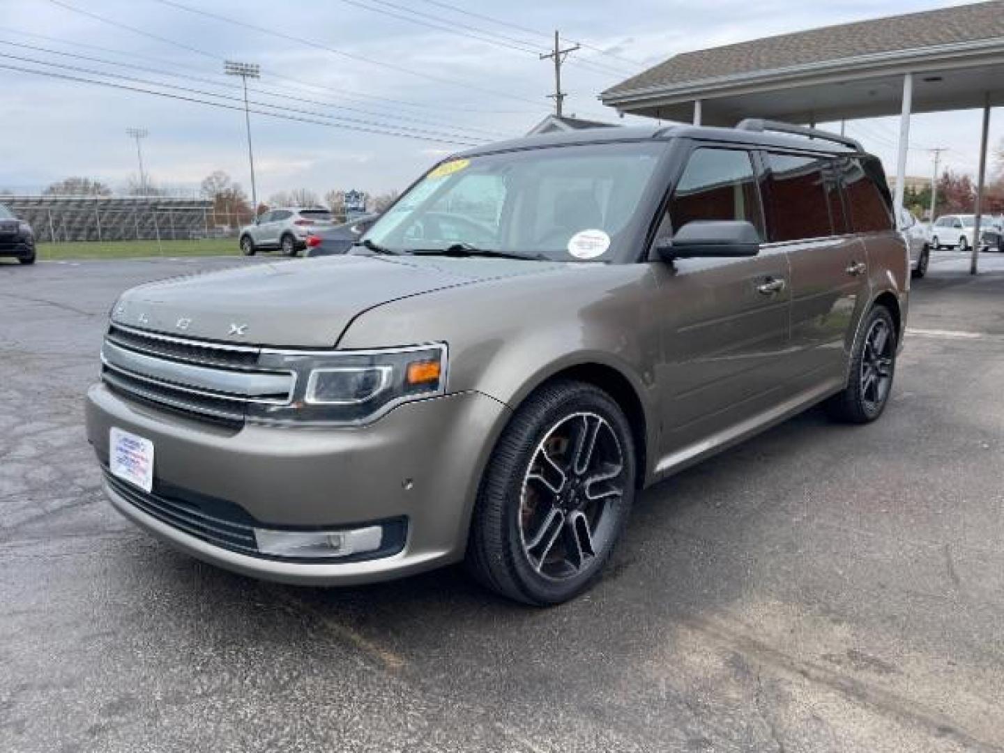 2013 Mineral Gray Metallic Ford Flex Limited AWD (2FMHK6DT2DB) with an 3.5L V6 DOHC 24V engine, 6-Speed Automatic Overdrive transmission, located at 1099 N County Rd 25A , Troy, OH, 45373, (937) 908-9800, 40.057079, -84.212883 - Photo#1