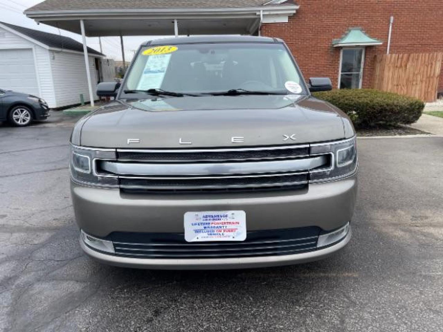 2013 Mineral Gray Metallic Ford Flex Limited AWD (2FMHK6DT2DB) with an 3.5L V6 DOHC 24V engine, 6-Speed Automatic Overdrive transmission, located at 1099 N County Rd 25A , Troy, OH, 45373, (937) 908-9800, 40.057079, -84.212883 - Photo#2