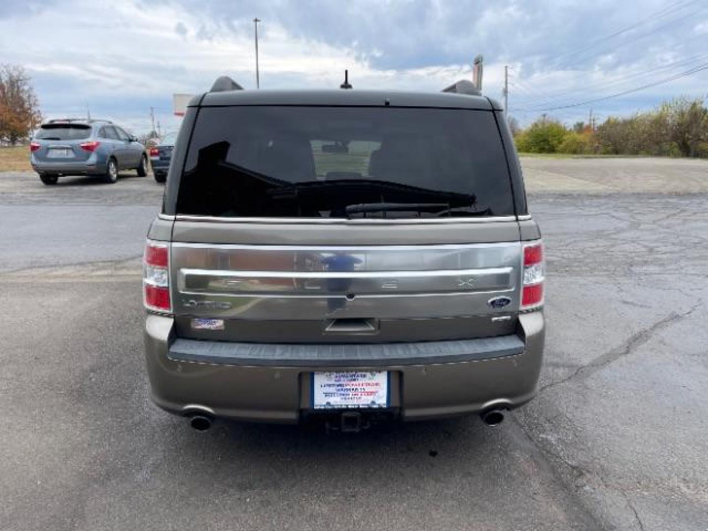 2013 Mineral Gray Metallic Ford Flex Limited AWD (2FMHK6DT2DB) with an 3.5L V6 DOHC 24V engine, 6-Speed Automatic Overdrive transmission, located at 1099 N County Rd 25A , Troy, OH, 45373, (937) 908-9800, 40.057079, -84.212883 - Photo#3