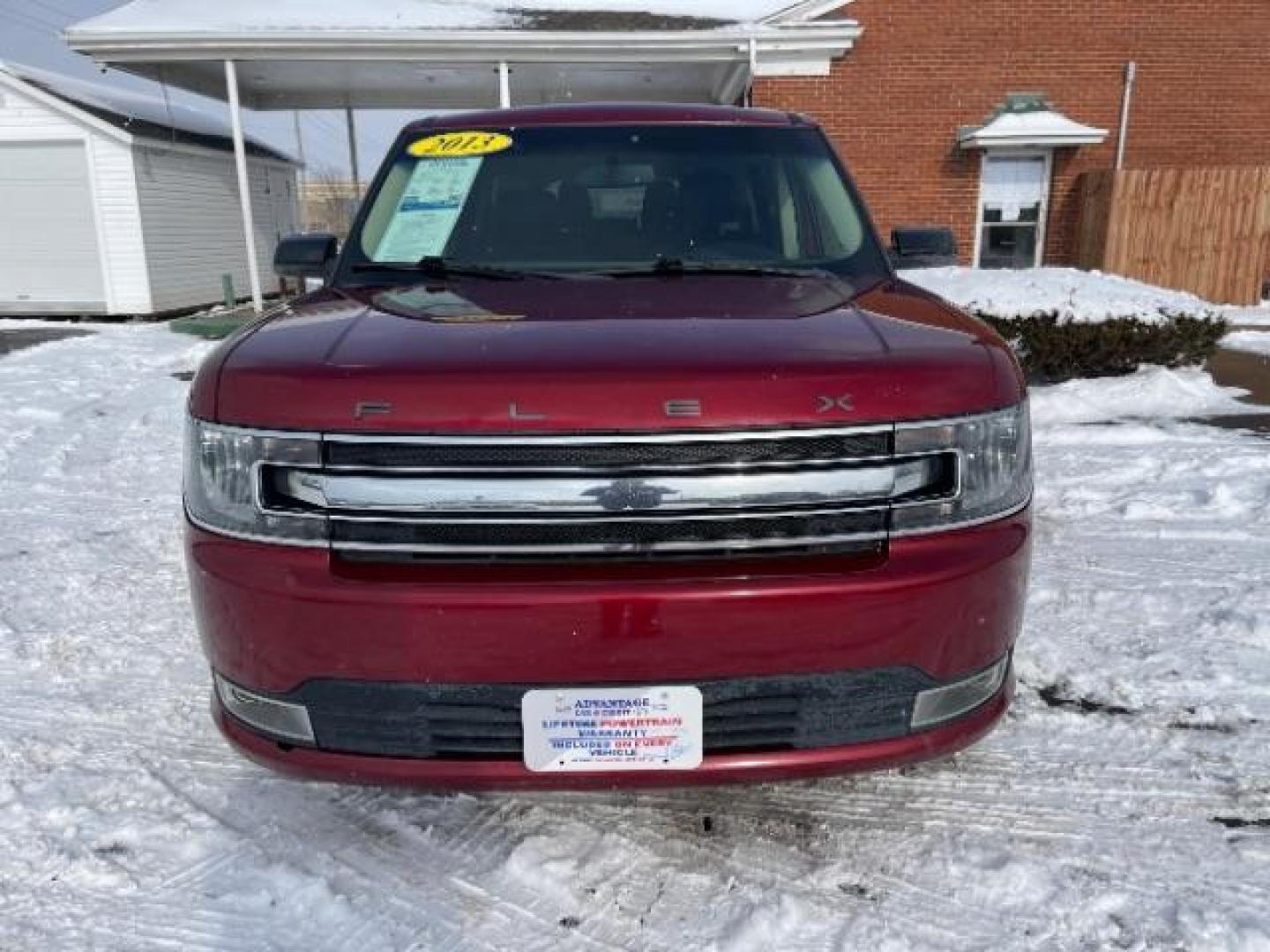 2013 Ruby Red Metallic Tinted Ford Flex SEL FWD (2FMGK5C84DB) with an 3.5L V6 DOHC 24V engine, 6-Speed Automatic Overdrive transmission, located at 1099 N County Rd 25A , Troy, OH, 45373, (937) 908-9800, 40.057079, -84.212883 - Photo#2