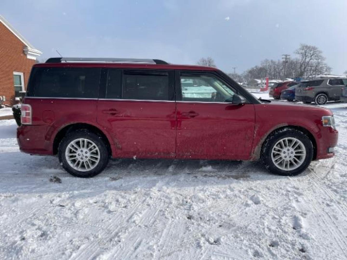 2013 Ruby Red Metallic Tinted Ford Flex SEL FWD (2FMGK5C84DB) with an 3.5L V6 DOHC 24V engine, 6-Speed Automatic Overdrive transmission, located at 1099 N County Rd 25A , Troy, OH, 45373, (937) 908-9800, 40.057079, -84.212883 - Photo#5