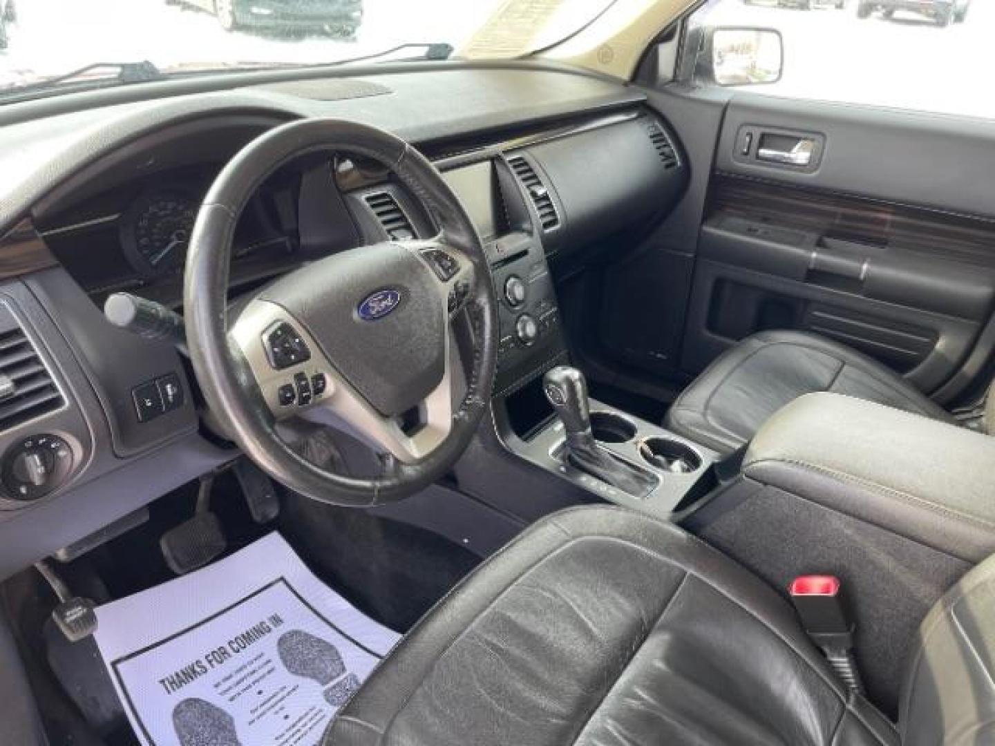 2013 Ruby Red Metallic Tinted Ford Flex SEL FWD (2FMGK5C84DB) with an 3.5L V6 DOHC 24V engine, 6-Speed Automatic Overdrive transmission, located at 1099 N County Rd 25A , Troy, OH, 45373, (937) 908-9800, 40.057079, -84.212883 - Photo#6