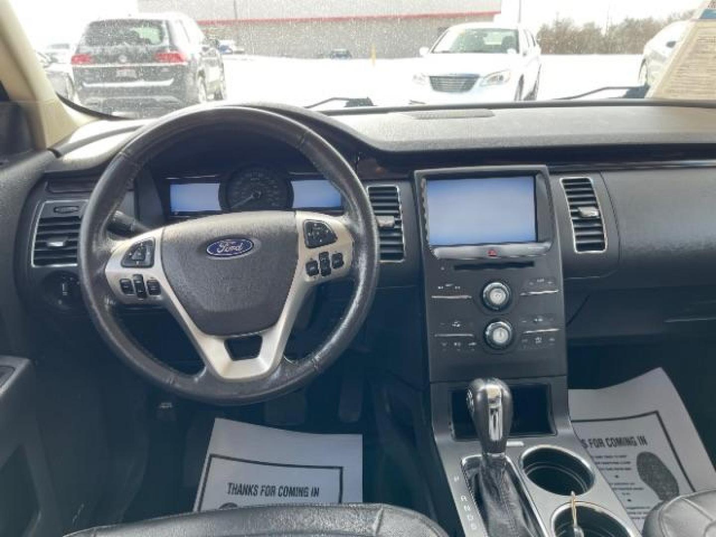 2013 Ruby Red Metallic Tinted Ford Flex SEL FWD (2FMGK5C84DB) with an 3.5L V6 DOHC 24V engine, 6-Speed Automatic Overdrive transmission, located at 1099 N County Rd 25A , Troy, OH, 45373, (937) 908-9800, 40.057079, -84.212883 - Photo#7