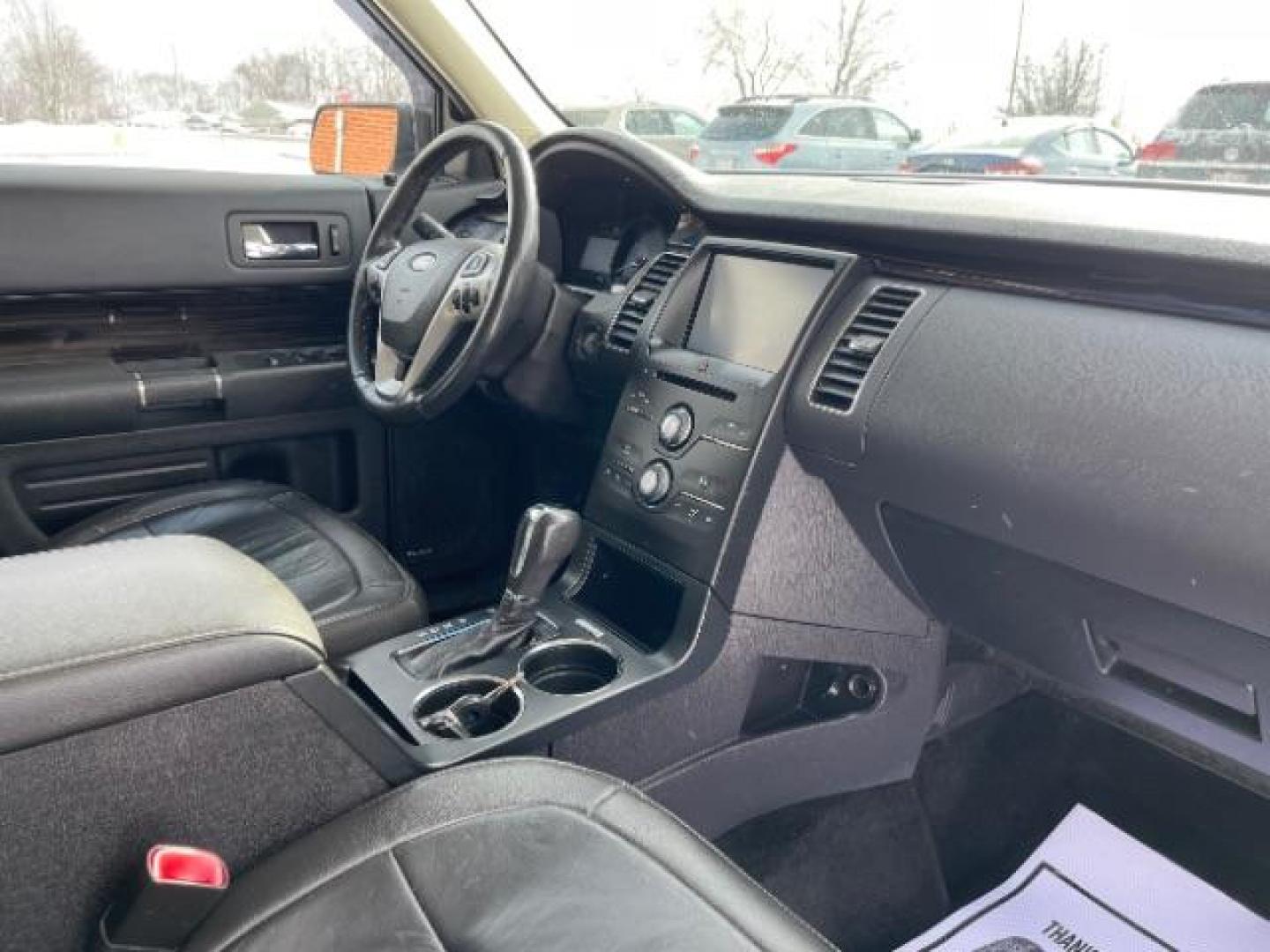 2013 Ruby Red Metallic Tinted Ford Flex SEL FWD (2FMGK5C84DB) with an 3.5L V6 DOHC 24V engine, 6-Speed Automatic Overdrive transmission, located at 1099 N County Rd 25A , Troy, OH, 45373, (937) 908-9800, 40.057079, -84.212883 - Photo#8