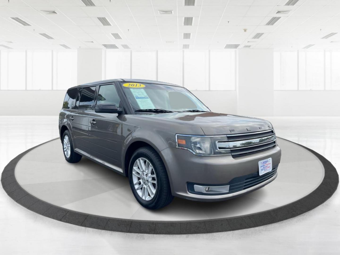 2013 Mineral Gray Metallic Ford Flex SEL FWD (2FMGK5C85DB) with an 3.5L V6 DOHC 24V engine, 6-Speed Automatic Overdrive transmission, located at 4508 South Dixie Dr, Moraine, OH, 45439, (937) 908-9800, 39.689976, -84.218452 - Third Row - Photo#0