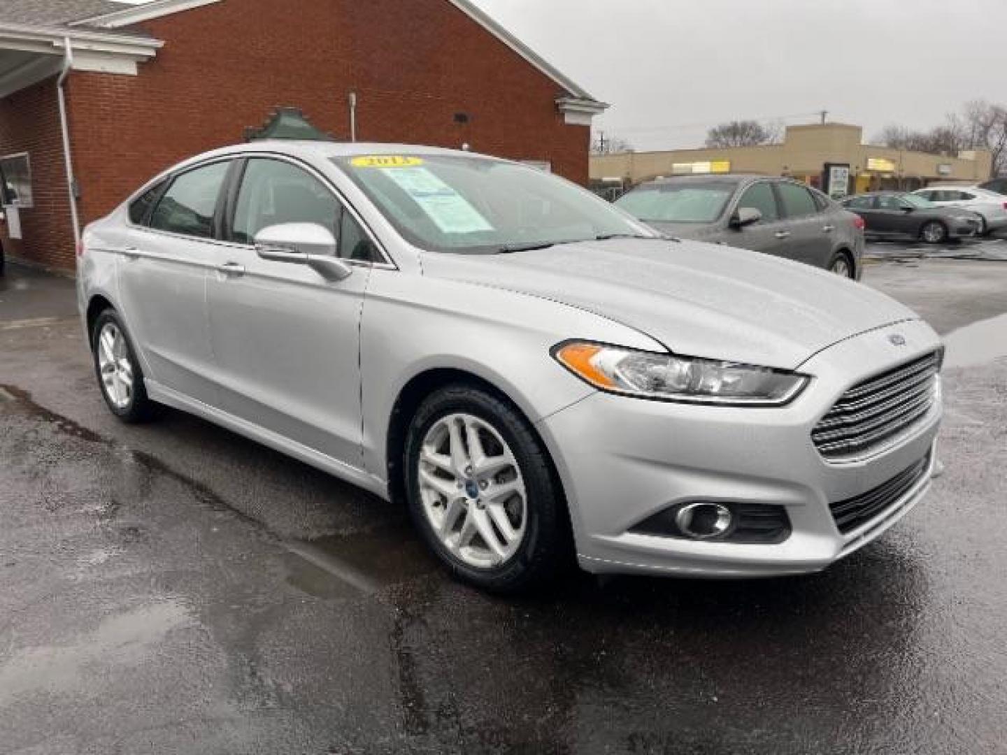 2013 Ingot Silver Ford Fusion SE (3FA6P0HR5DR) with an 1.6L L4 DOHC 16V engine, located at 1099 N County Rd 25A , Troy, OH, 45373, (937) 908-9800, 40.057079, -84.212883 - Photo#0