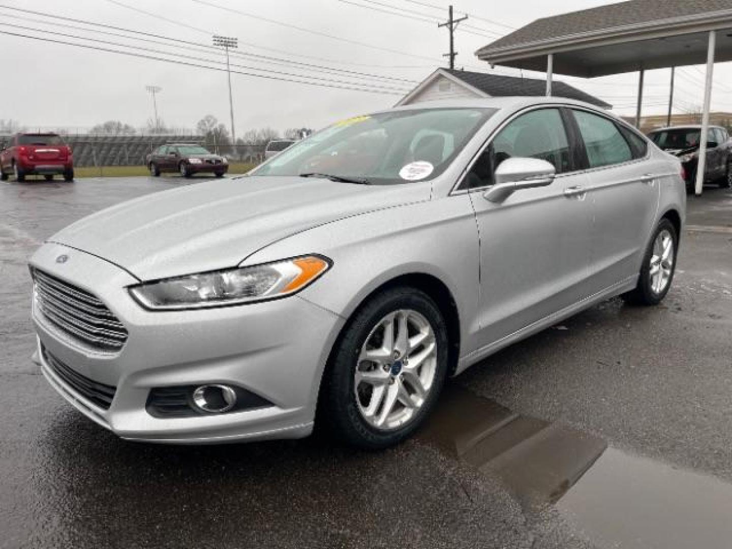 2013 Ingot Silver Ford Fusion SE (3FA6P0HR5DR) with an 1.6L L4 DOHC 16V engine, located at 1099 N County Rd 25A , Troy, OH, 45373, (937) 908-9800, 40.057079, -84.212883 - Photo#1