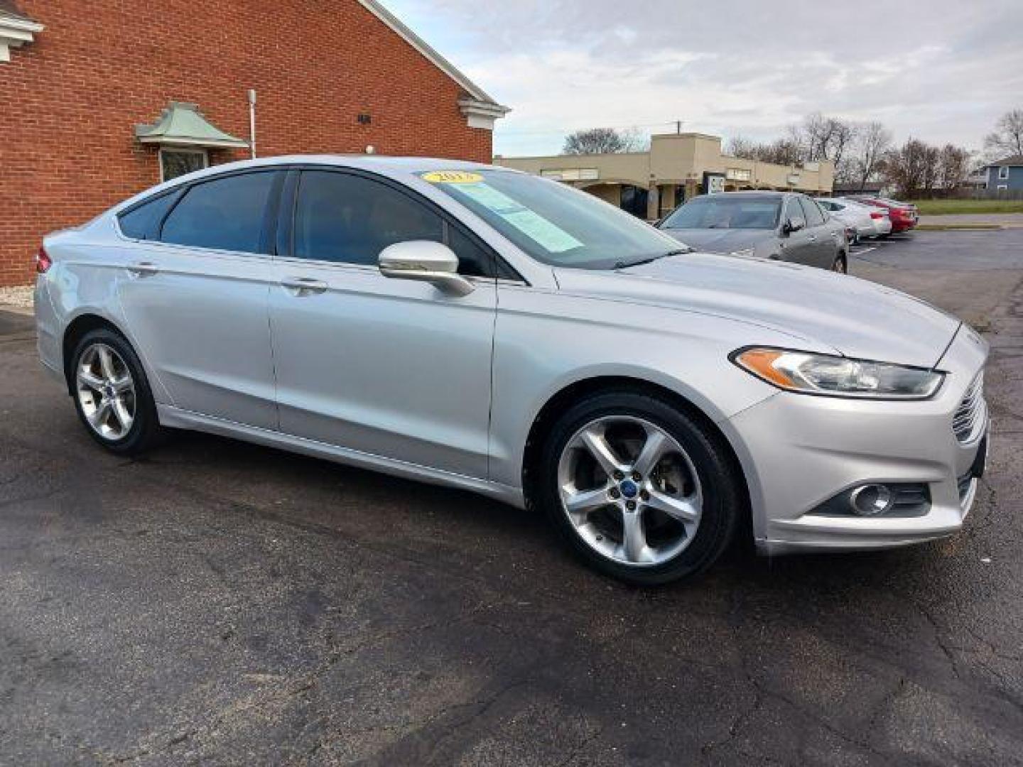 2013 Ingot Silver Ford Fusion SE (3FA6P0H95DR) with an 2.0L L4 DOHC 16V engine, located at 1184 Kauffman Ave, Fairborn, OH, 45324, (937) 908-9800, 39.807072, -84.030914 - Photo#0