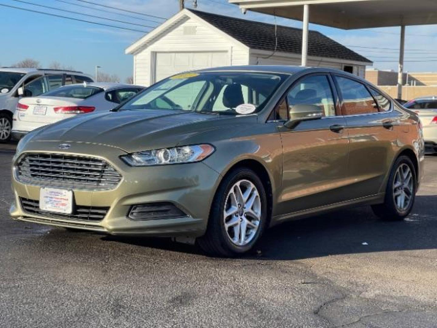 2013 Ginger Ale Ford Fusion SE (3FA6P0H73DR) with an 2.5L L4 DOHC 16V engine, located at 4508 South Dixie Dr, Moraine, OH, 45439, (937) 908-9800, 39.689976, -84.218452 - Photo#1