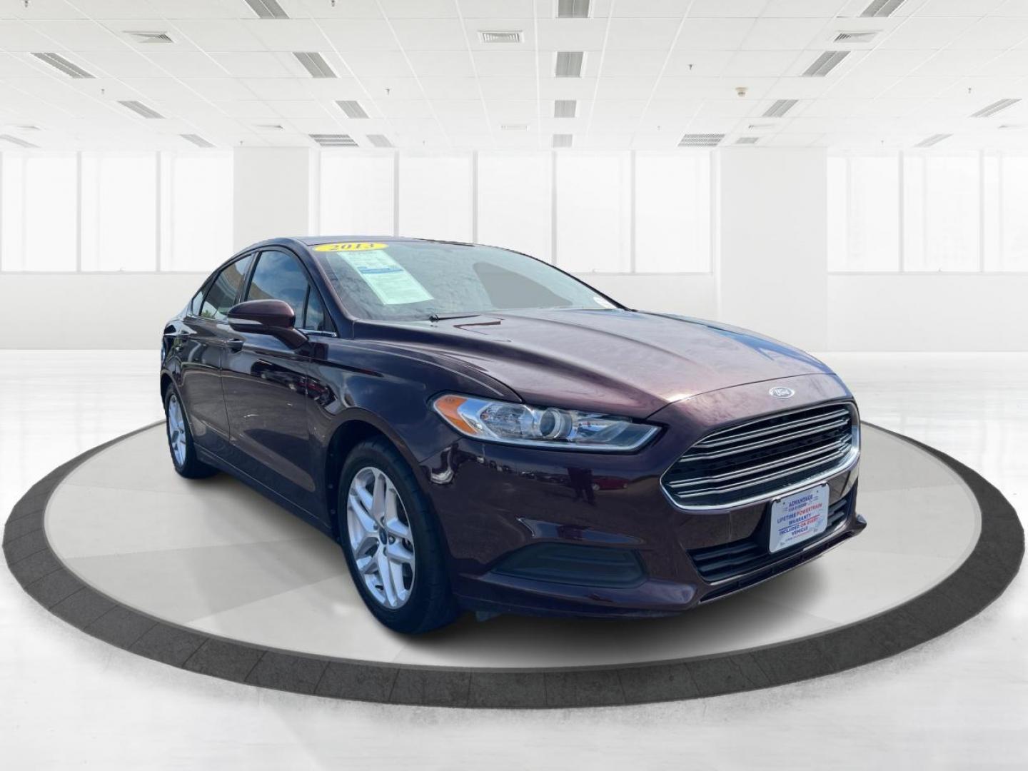 2013 Bordeaux Reserve Ford Fusion (3FA6P0H76DR) with an 2.5L L4 DOHC 16V engine, located at 1951 S Dayton Lakeview Rd., New Carlisle, OH, 45344, (937) 908-9800, 39.890999, -84.050255 - Photo#0