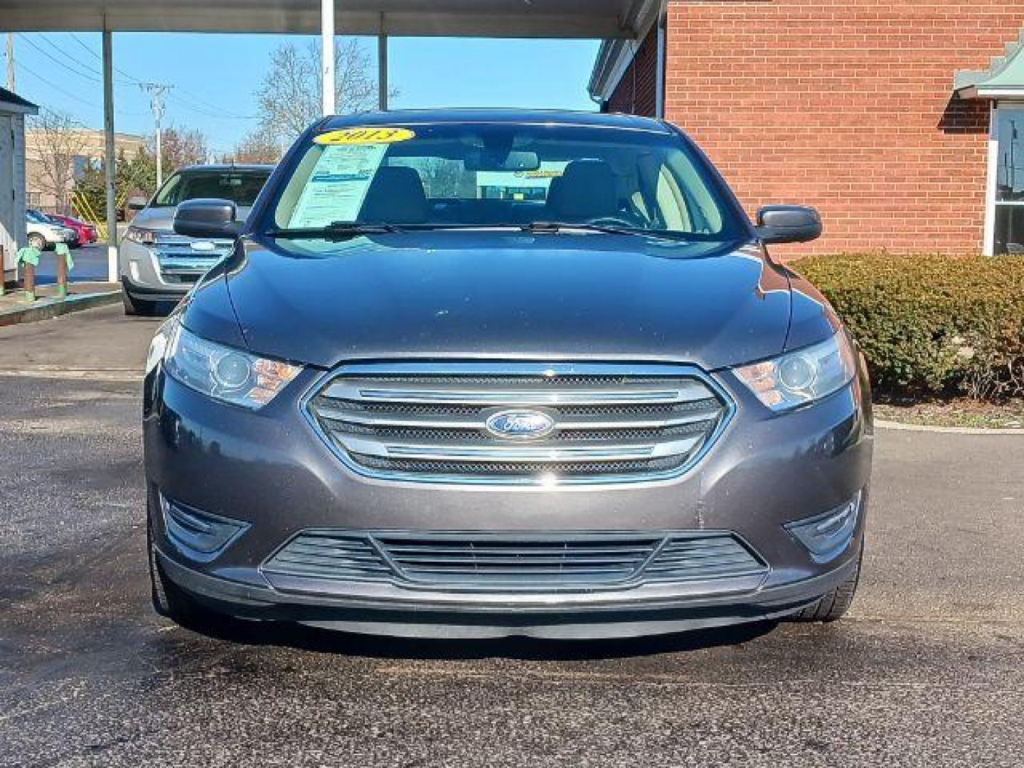 2013 Sterling Gray Metallic Ford Taurus SEL FWD (1FAHP2E81DG) with an 3.5L V6 DOHC 24V engine, 6-Speed Automatic transmission, located at 1951 S Dayton Lakeview Rd., New Carlisle, OH, 45344, (937) 908-9800, 39.890999, -84.050255 - Photo#1