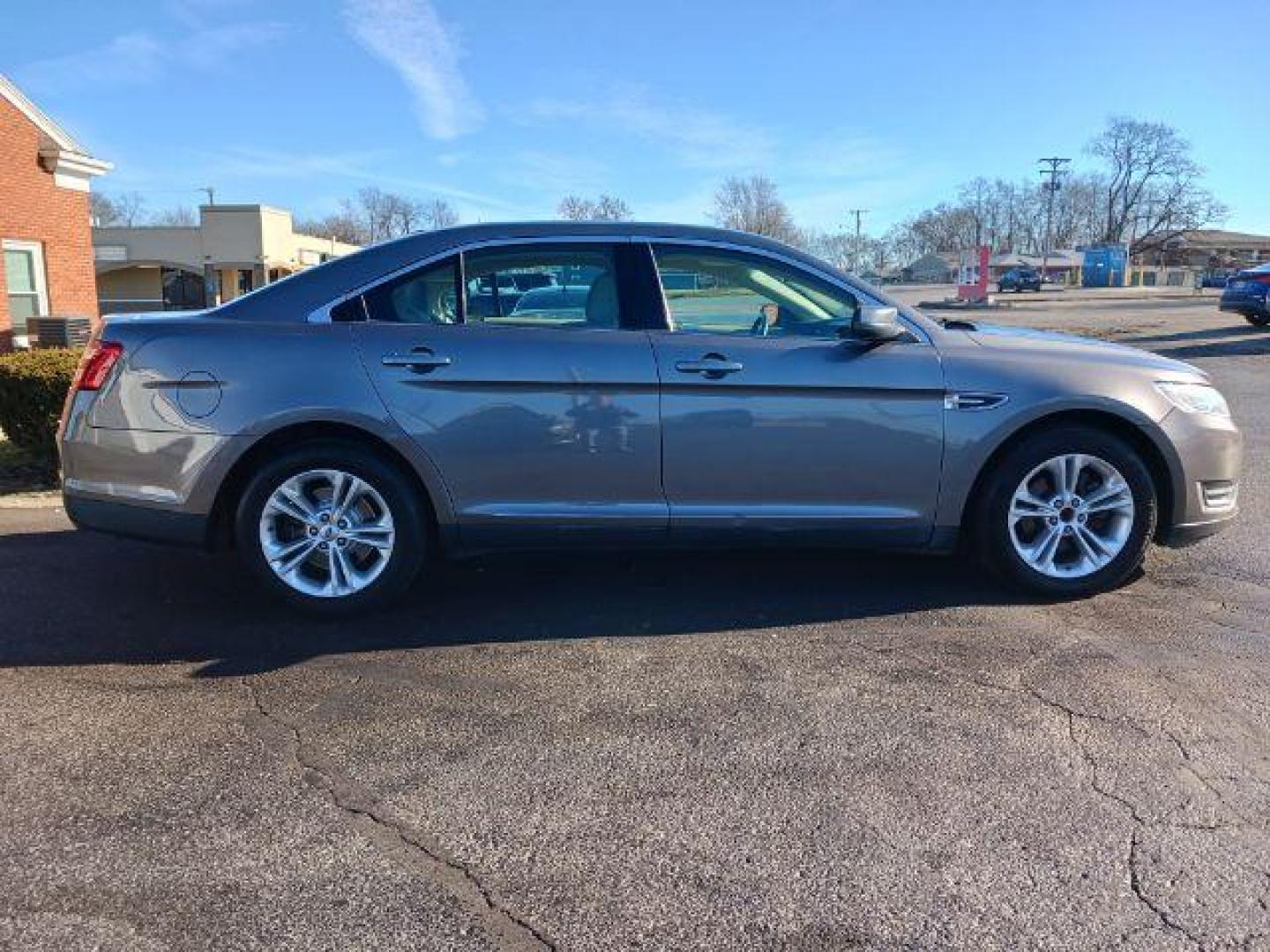 2013 Sterling Gray Metallic Ford Taurus SEL FWD (1FAHP2E81DG) with an 3.5L V6 DOHC 24V engine, 6-Speed Automatic transmission, located at 1951 S Dayton Lakeview Rd., New Carlisle, OH, 45344, (937) 908-9800, 39.890999, -84.050255 - Photo#4