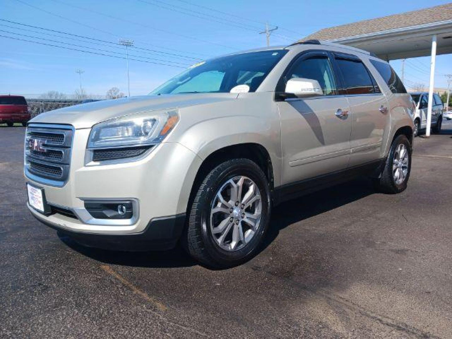 2013 Champagne Silver Metallic GMC Acadia SLT-1 AWD (1GKKVRKD0DJ) with an 3.6L V6 DOHC 24V engine, 6-Speed Automatic transmission, located at 401 Woodman Dr, Riverside, OH, 45431, (937) 908-9800, 39.760899, -84.123421 - Photo#2