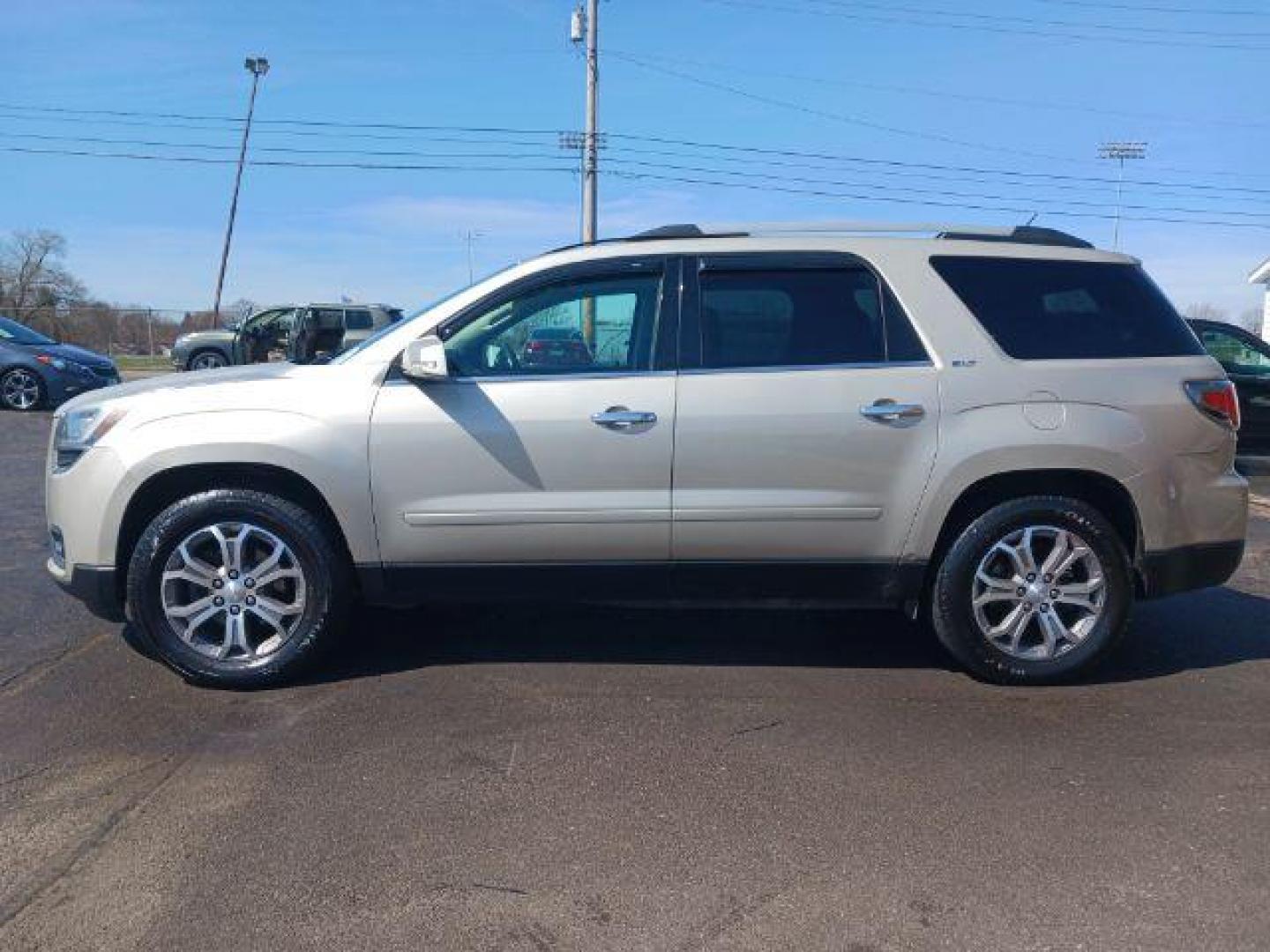 2013 Champagne Silver Metallic GMC Acadia SLT-1 AWD (1GKKVRKD0DJ) with an 3.6L V6 DOHC 24V engine, 6-Speed Automatic transmission, located at 401 Woodman Dr, Riverside, OH, 45431, (937) 908-9800, 39.760899, -84.123421 - Photo#3