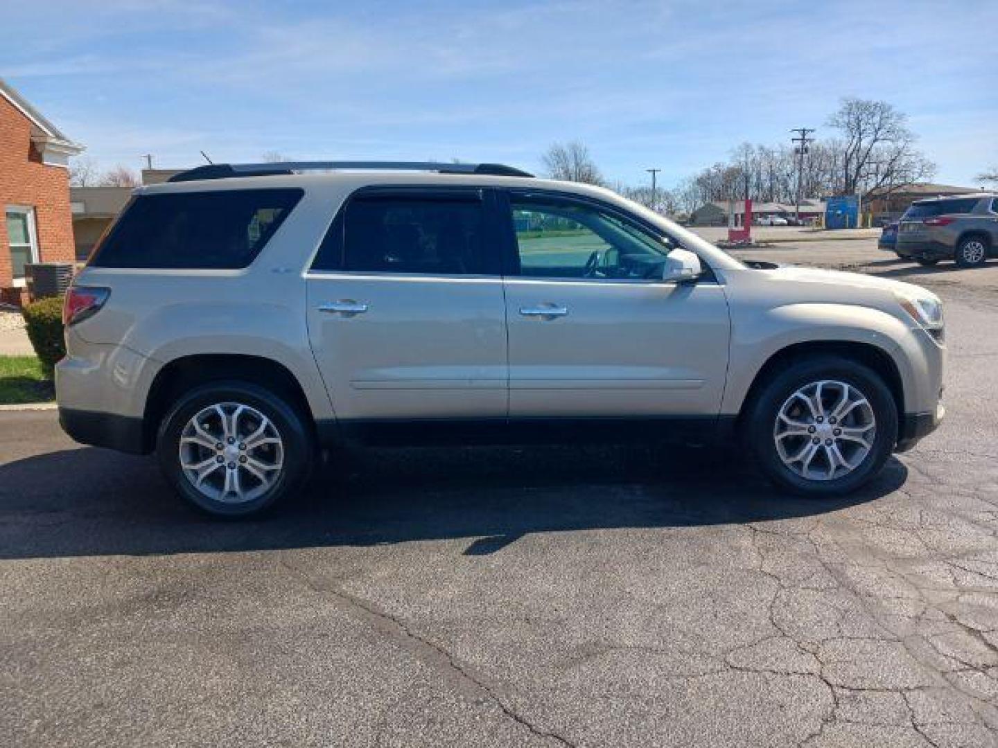 2013 Champagne Silver Metallic GMC Acadia SLT-1 AWD (1GKKVRKD0DJ) with an 3.6L V6 DOHC 24V engine, 6-Speed Automatic transmission, located at 401 Woodman Dr, Riverside, OH, 45431, (937) 908-9800, 39.760899, -84.123421 - Photo#4