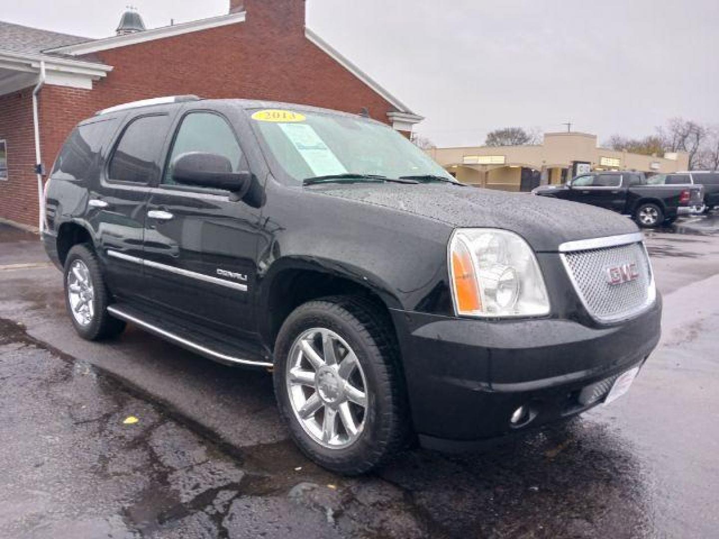 2013 Onyx Black GMC Yukon Denali 4WD (1GKS2EEF7DR) with an 6.2L V8 OHV 16V engine, 6-Speed Automatic transmission, located at 1184 Kauffman Ave, Fairborn, OH, 45324, (937) 908-9800, 39.807072, -84.030914 - Photo#0