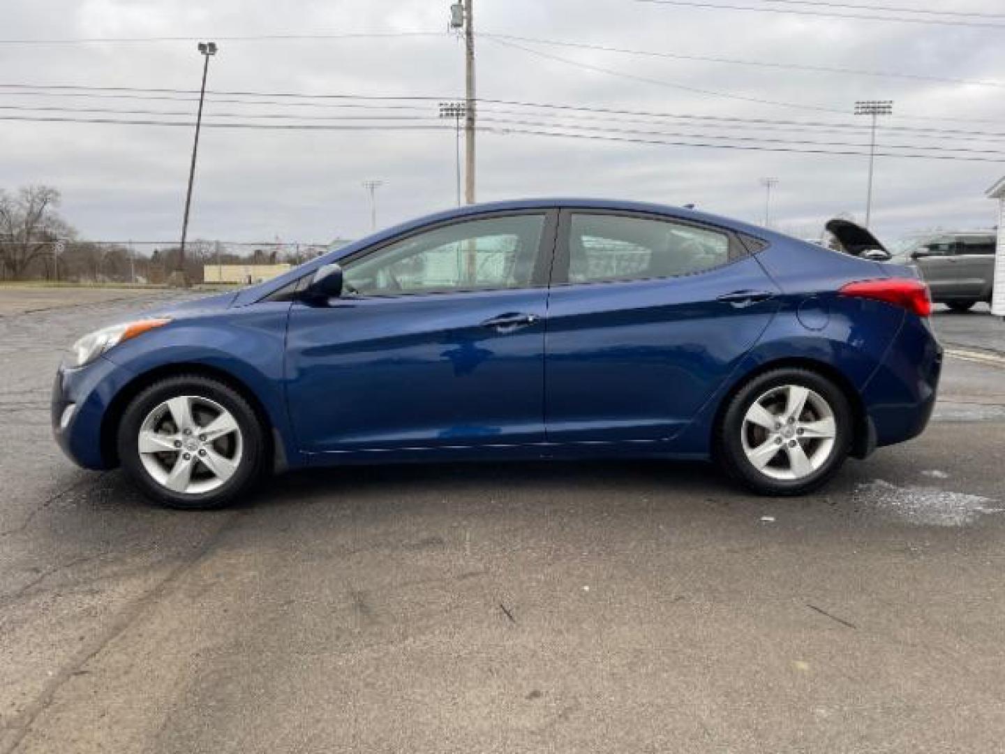 2013 Blue Sky Metallic Hyundai Elantra GLS A/T (KMHDH4AE7DU) with an 1.8L L4 DOHC 16V engine, 6-Speed Automatic transmission, located at 4508 South Dixie Dr, Moraine, OH, 45439, (937) 908-9800, 39.689976, -84.218452 - Photo#5