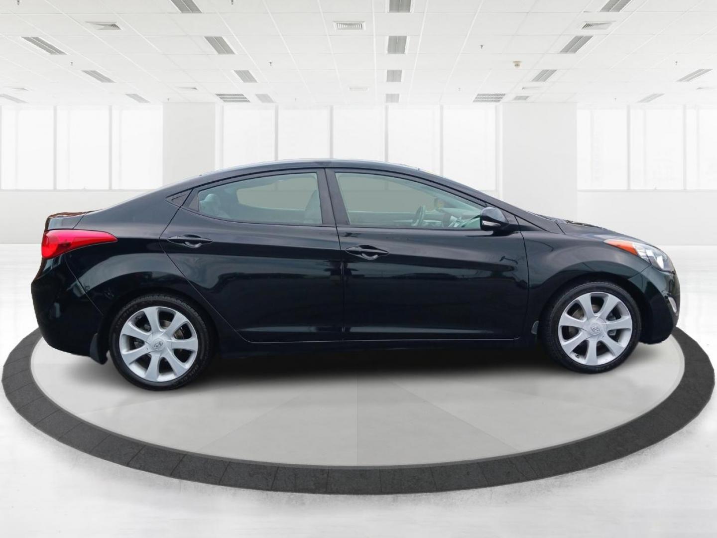 2013 Midnight Black Metallic Hyundai Elantra (5NPDH4AE0DH) with an 1.8L L4 DOHC 16V engine, 6-Speed Automatic transmission, located at 4508 South Dixie Dr, Moraine, OH, 45439, (937) 908-9800, 39.689976, -84.218452 - Photo#1