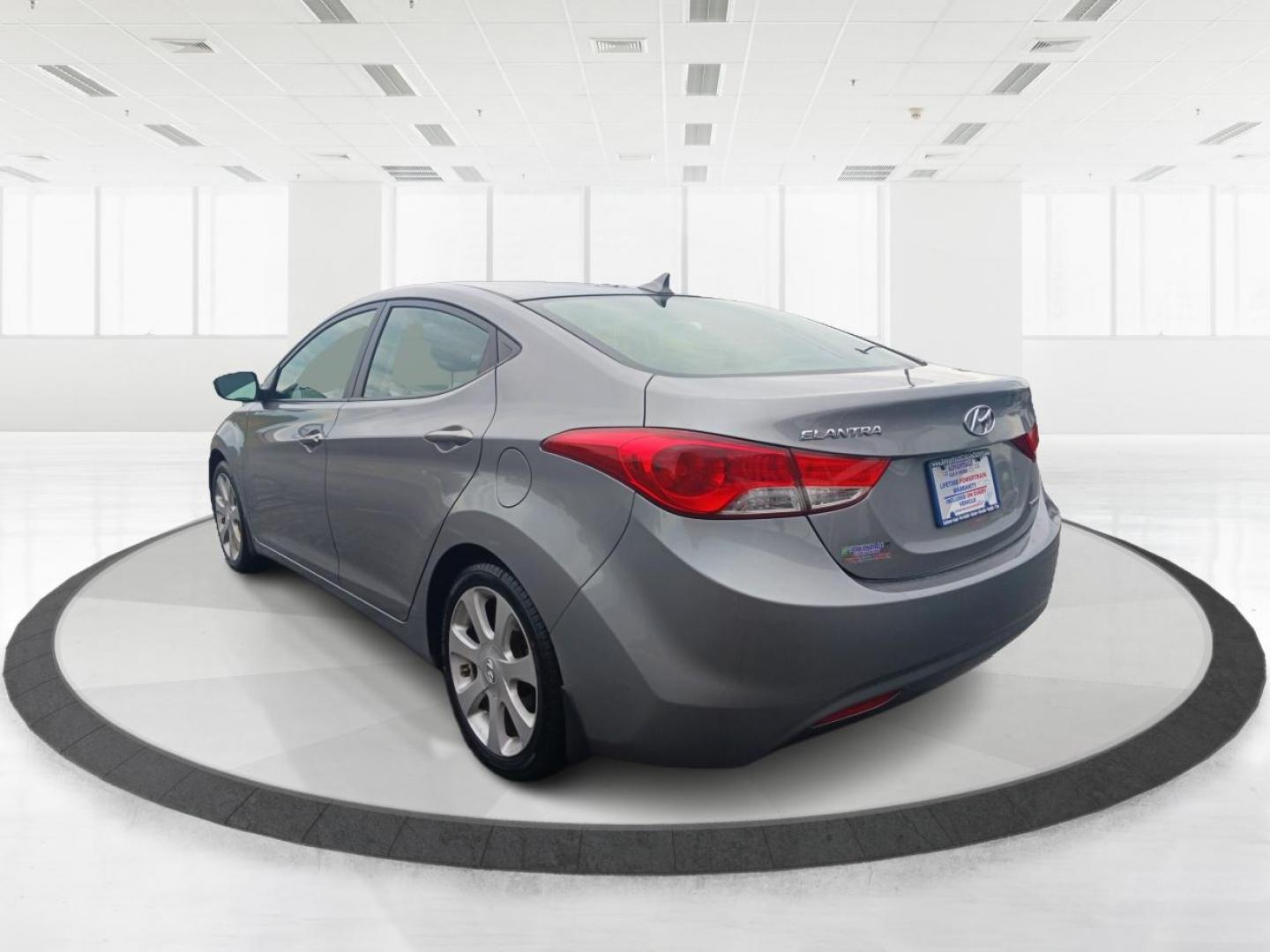 2013 Harbor Gray Metallic Hyundai Elantra Limited (KMHDH4AE1DU) with an 1.8L L4 DOHC 16V engine, 6-Speed Automatic transmission, located at 1951 S Dayton Lakeview Rd., New Carlisle, OH, 45344, (937) 908-9800, 39.890999, -84.050255 - Photo#4