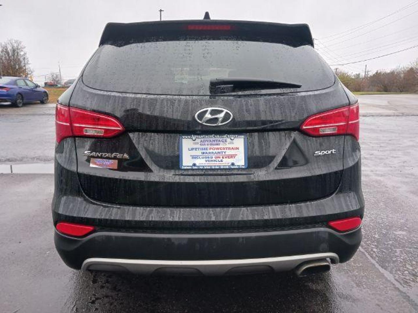 2013 Twilight Black Hyundai Santa Fe Sport 2.4 FWD (5XYZU3LB3DG) with an 2.4L L4 DOHC 16V engine, 6-Speed Automatic transmission, located at 401 Woodman Dr, Riverside, OH, 45431, (937) 908-9800, 39.760899, -84.123421 - Photo#5