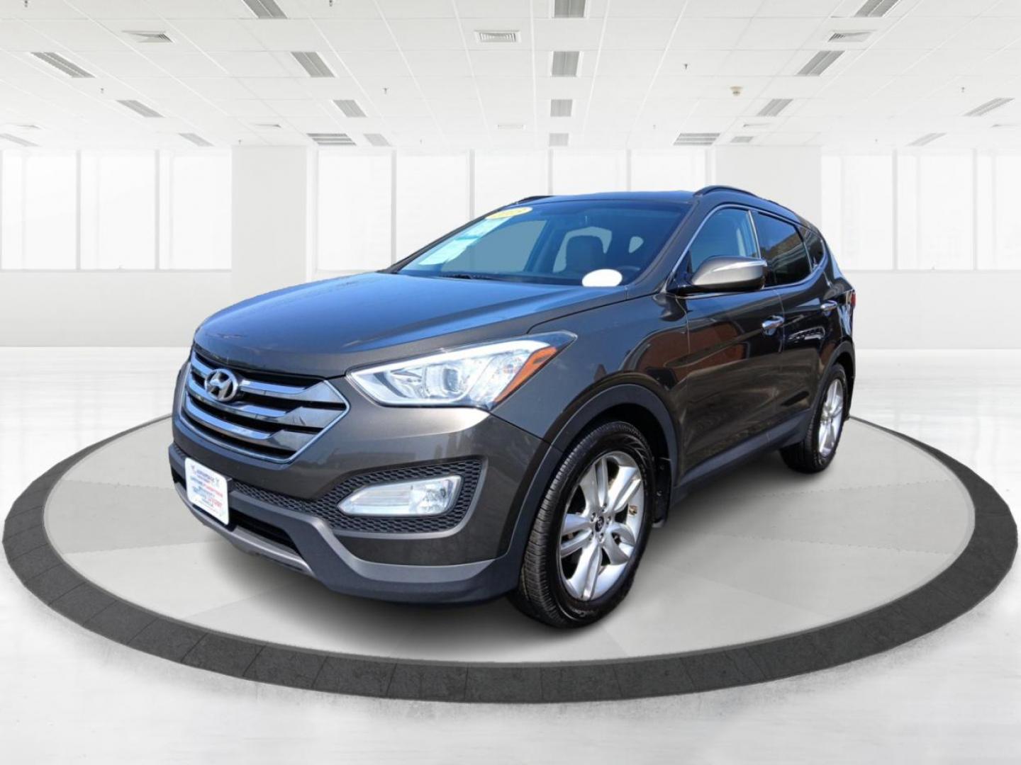 2013 Cabo Bronze Hyundai Santa Fe Sport 2.0 AWD (5XYZUDLA2DG) with an 2.0L L4 DOHC 16V engine, 6-Speed Automatic transmission, located at 401 Woodman Dr, Riverside, OH, 45431, (937) 908-9800, 39.760899, -84.123421 - Photo#7