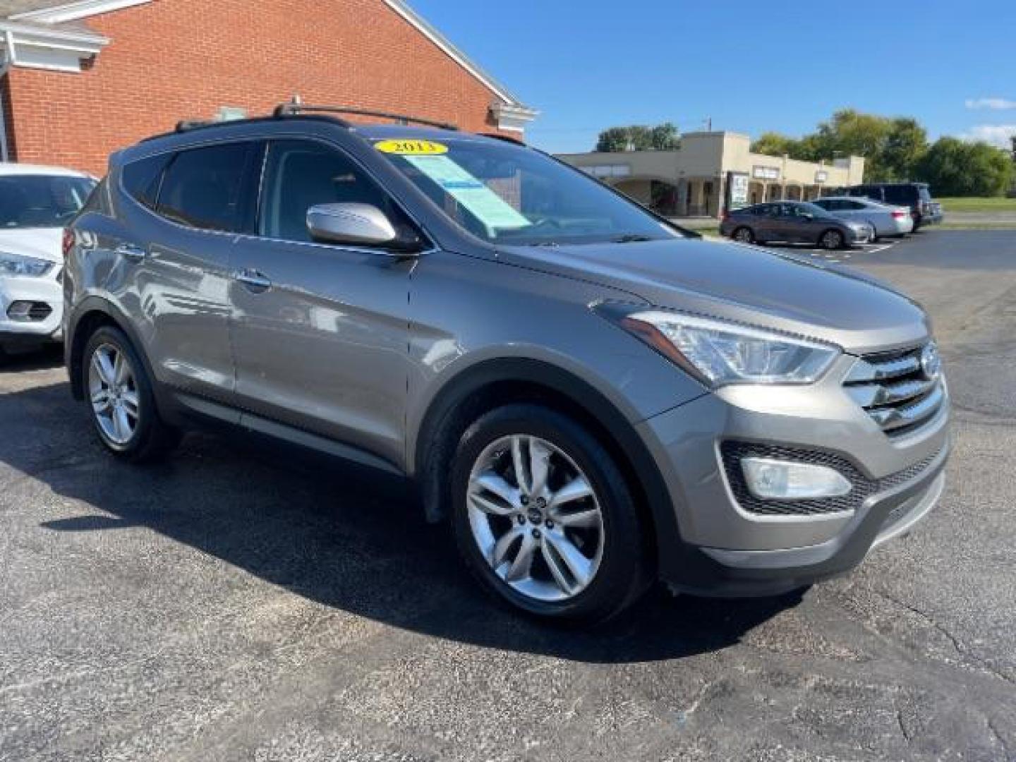 2013 Mineral Gray Hyundai Santa Fe Sport 2.0 FWD (5XYZU3LA8DG) with an 2.0L L4 DOHC 16V engine, 6-Speed Automatic transmission, located at 1184 Kauffman Ave, Fairborn, OH, 45324, (937) 908-9800, 39.807072, -84.030914 - Photo#0