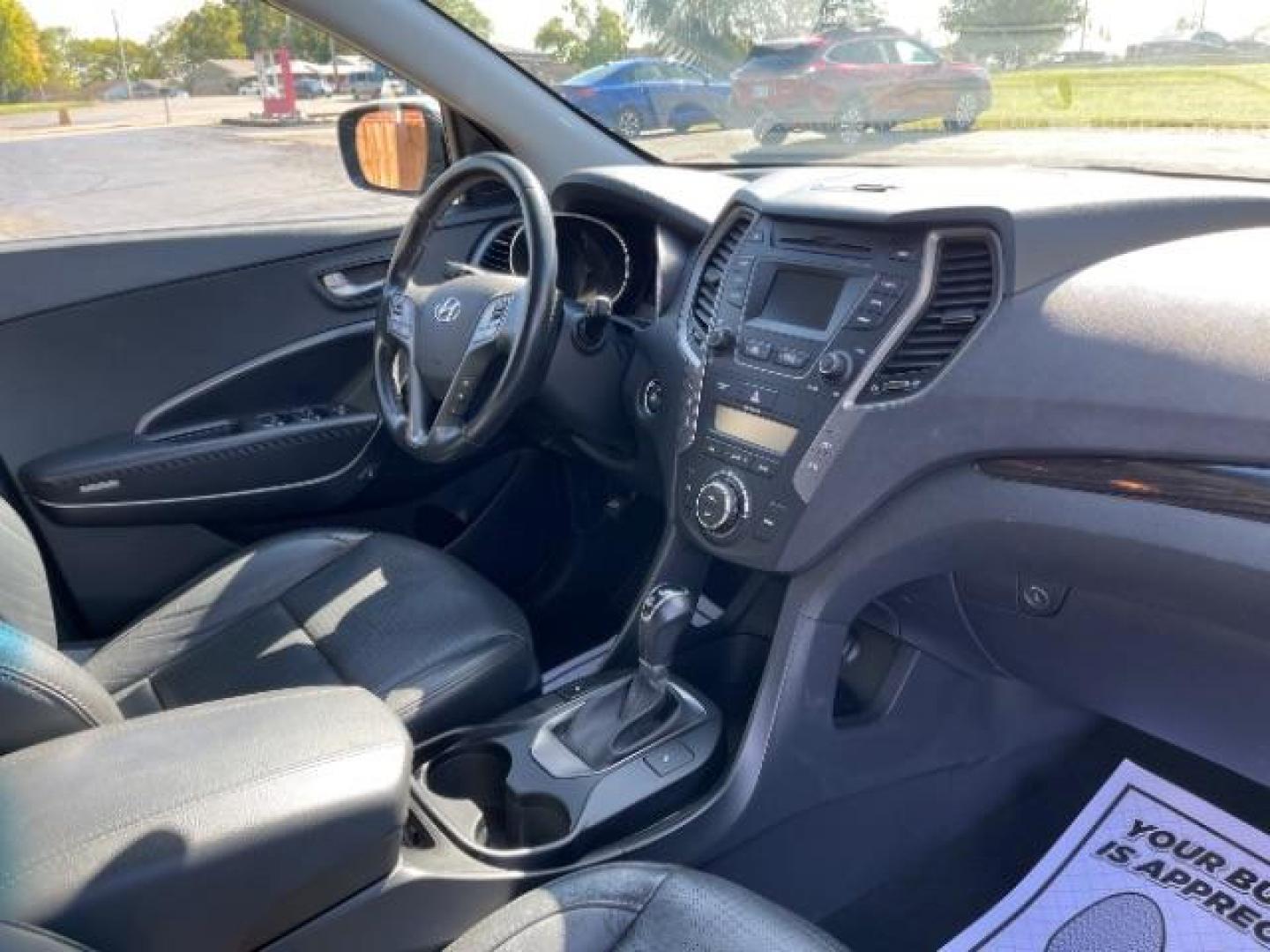 2013 Mineral Gray Hyundai Santa Fe Sport 2.0 FWD (5XYZU3LA8DG) with an 2.0L L4 DOHC 16V engine, 6-Speed Automatic transmission, located at 1184 Kauffman Ave, Fairborn, OH, 45324, (937) 908-9800, 39.807072, -84.030914 - Photo#10