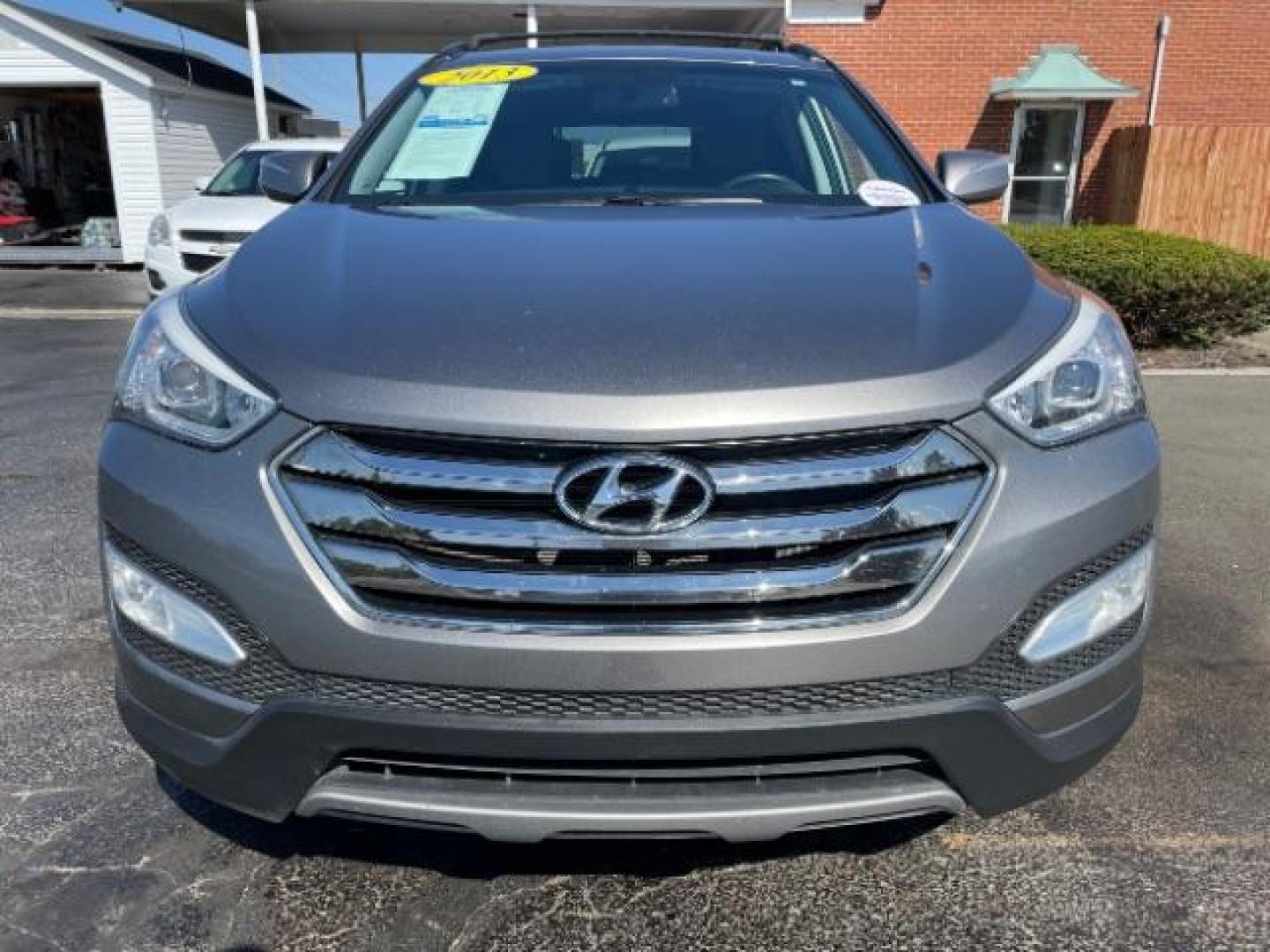 2013 Mineral Gray Hyundai Santa Fe Sport 2.0 FWD (5XYZU3LA8DG) with an 2.0L L4 DOHC 16V engine, 6-Speed Automatic transmission, located at 1184 Kauffman Ave, Fairborn, OH, 45324, (937) 908-9800, 39.807072, -84.030914 - Photo#2