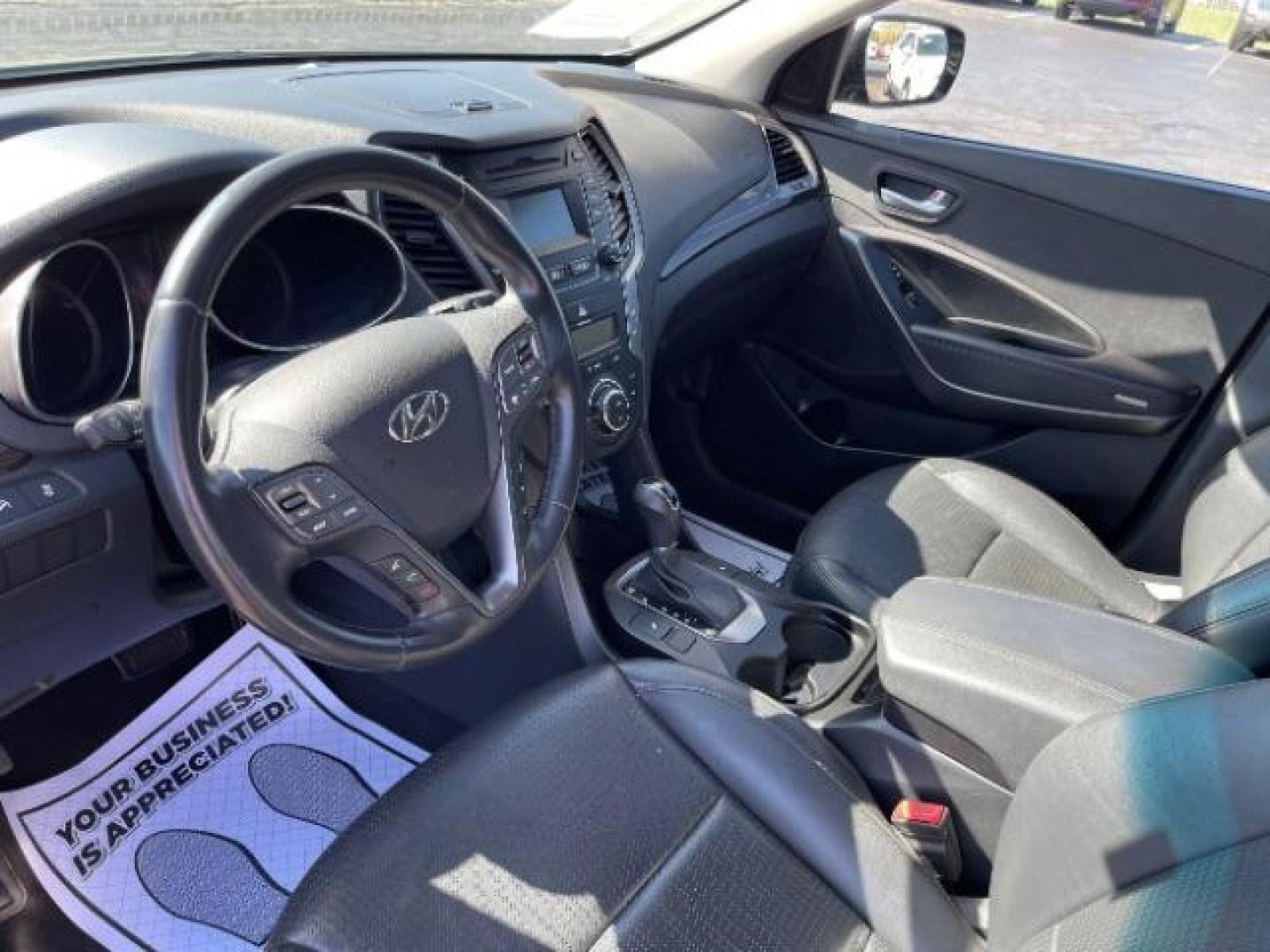 2013 Mineral Gray Hyundai Santa Fe Sport 2.0 FWD (5XYZU3LA8DG) with an 2.0L L4 DOHC 16V engine, 6-Speed Automatic transmission, located at 1184 Kauffman Ave, Fairborn, OH, 45324, (937) 908-9800, 39.807072, -84.030914 - Photo#6