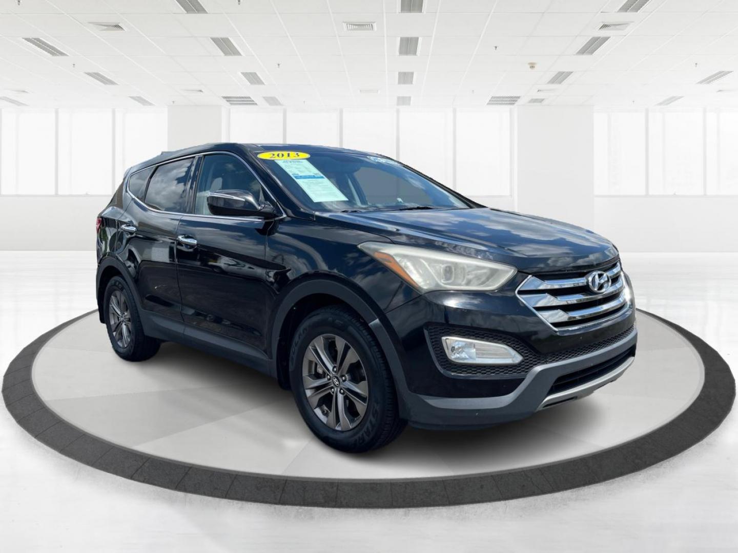 2013 Twilight Black Hyundai Santa Fe Sport 2.4 AWD (5XYZUDLB8DG) with an 2.4L L4 DOHC 16V engine, 6-Speed Automatic transmission, located at 1951 S Dayton Lakeview Rd., New Carlisle, OH, 45344, (937) 908-9800, 39.890999, -84.050255 - Photo#0