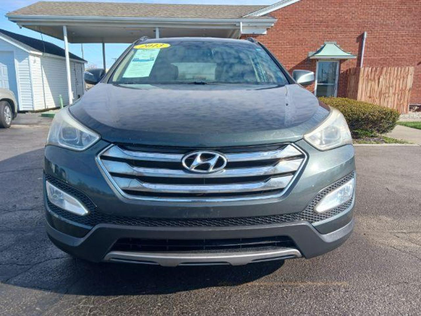 2013 Hyundai Santa Fe Sport 2.4 FWD (5XYZU3LB8DG) with an 2.4L L4 DOHC 16V engine, 6-Speed Automatic transmission, located at 1951 S Dayton Lakeview Rd., New Carlisle, OH, 45344, (937) 908-9800, 39.890999, -84.050255 - 2013 Hyundai Santa Fe Sport 2.4 FWD - Photo#1