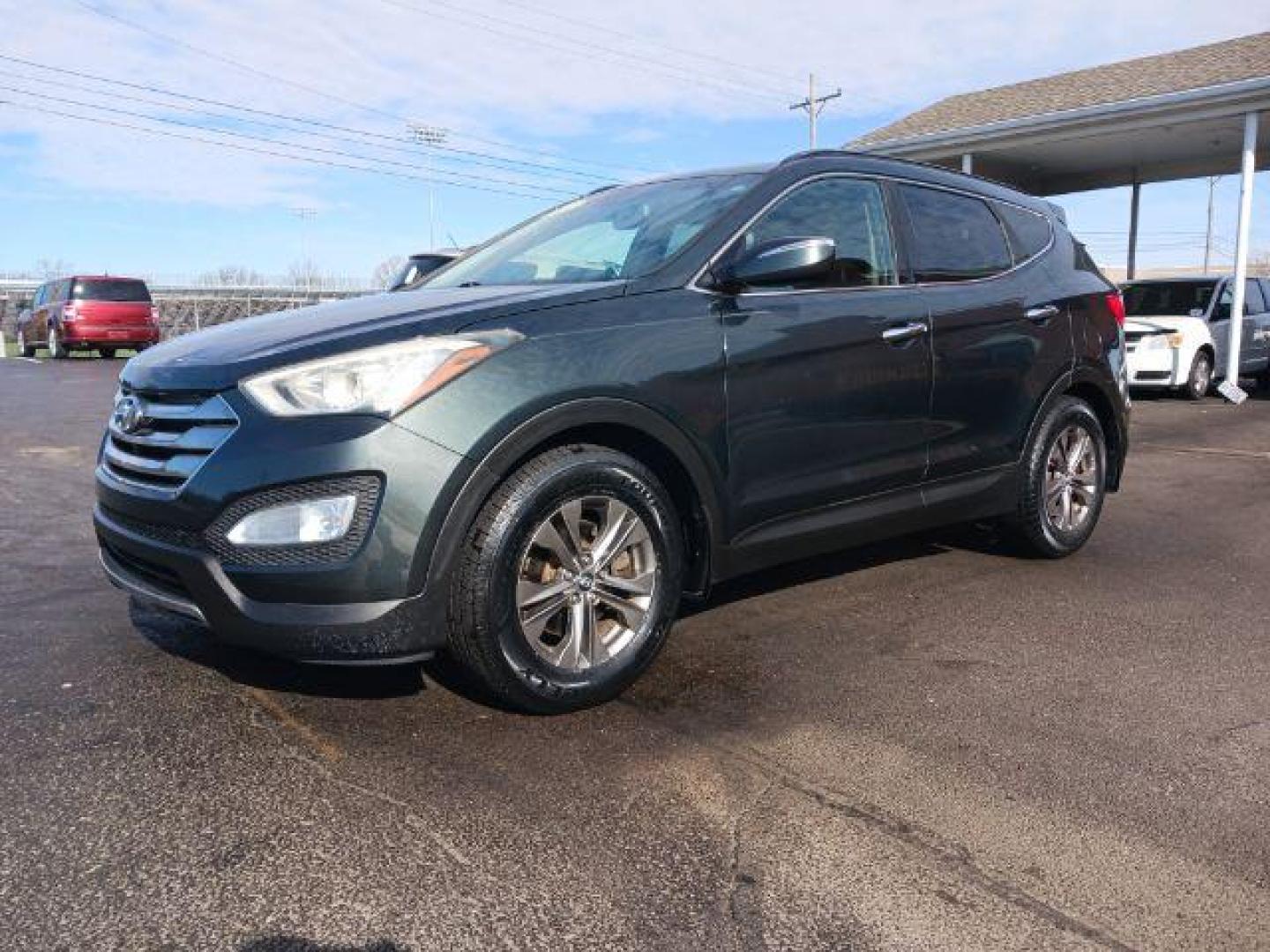 2013 Hyundai Santa Fe Sport 2.4 FWD (5XYZU3LB8DG) with an 2.4L L4 DOHC 16V engine, 6-Speed Automatic transmission, located at 1951 S Dayton Lakeview Rd., New Carlisle, OH, 45344, (937) 908-9800, 39.890999, -84.050255 - 2013 Hyundai Santa Fe Sport 2.4 FWD - Photo#2